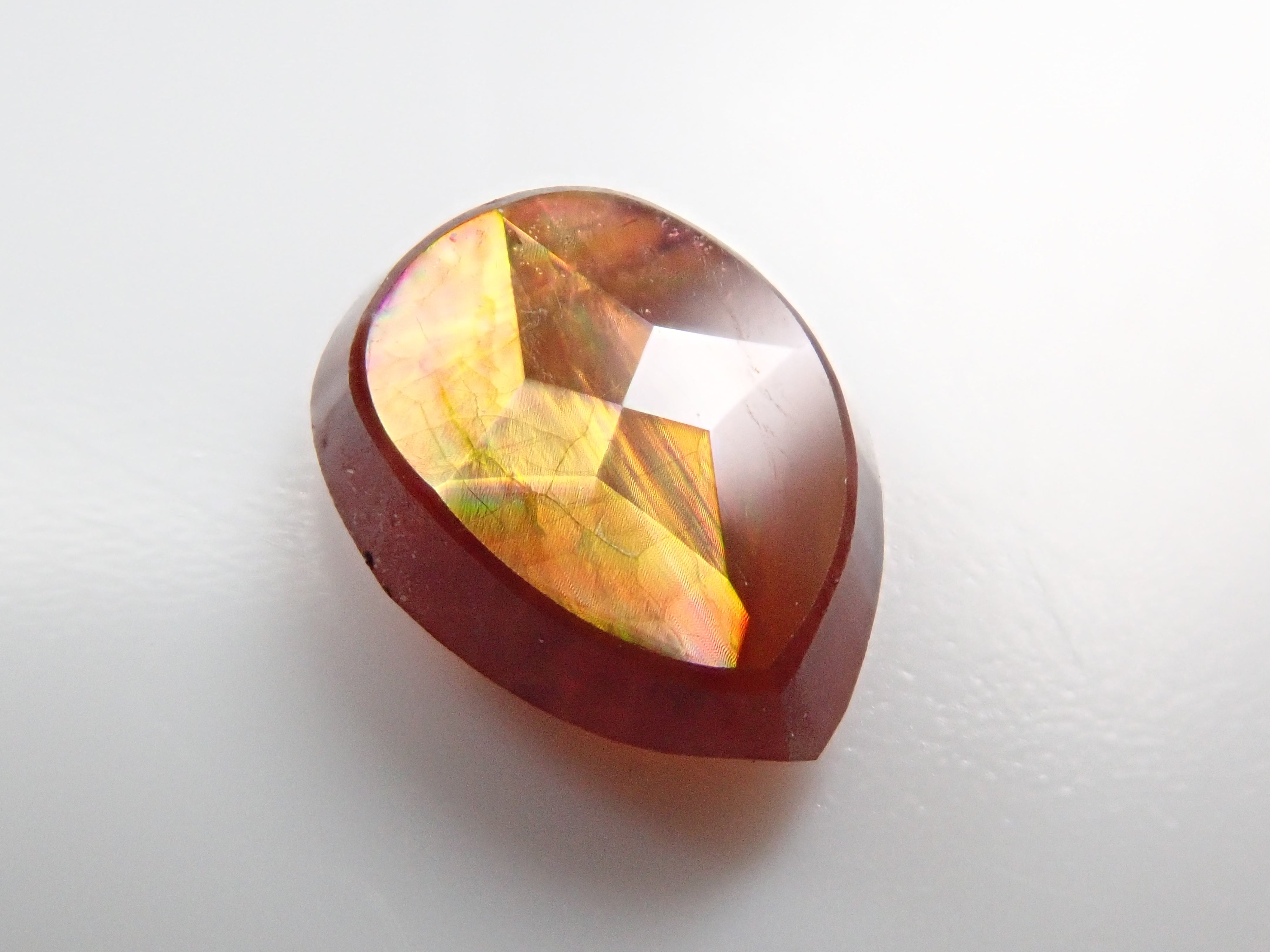 Andradite garnet (commonly known as rainbow garnet) 0.910ct rough stone