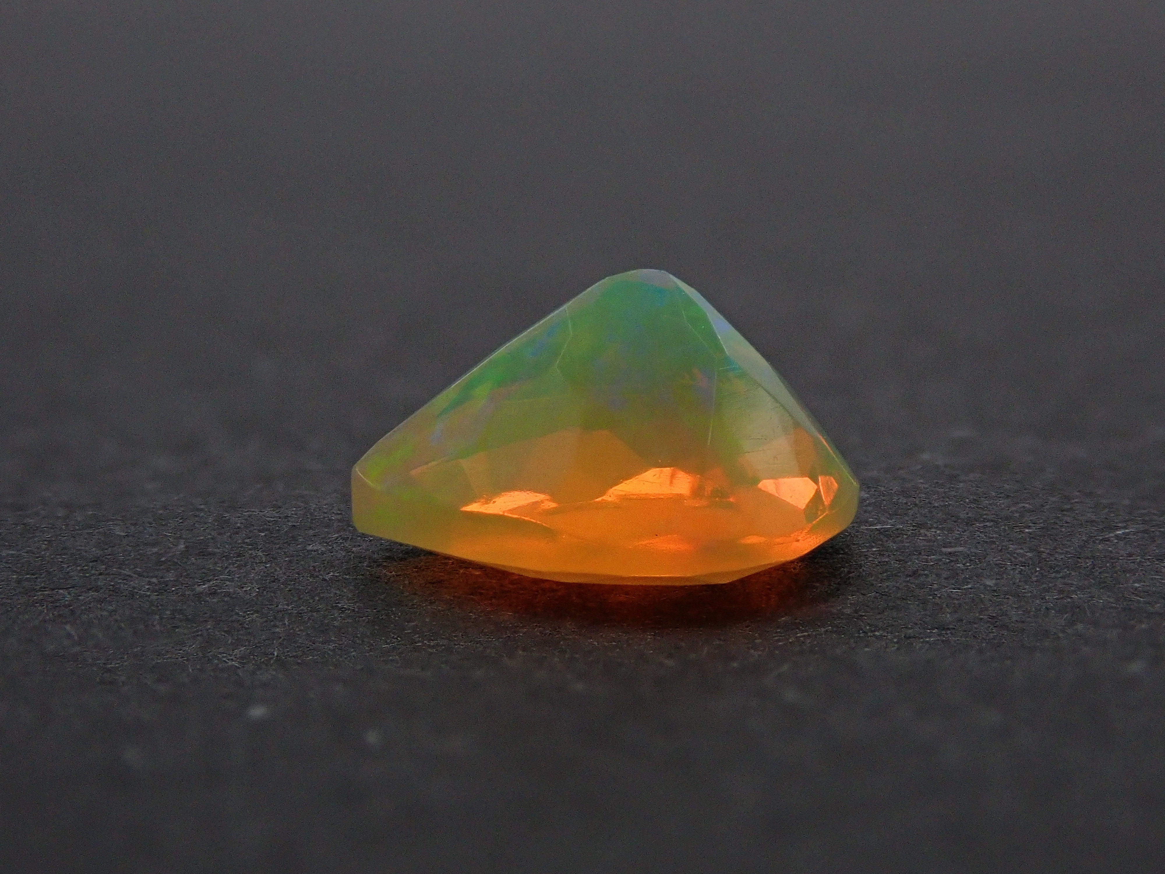 Fire opal 0.721ct loose (faceted cut)