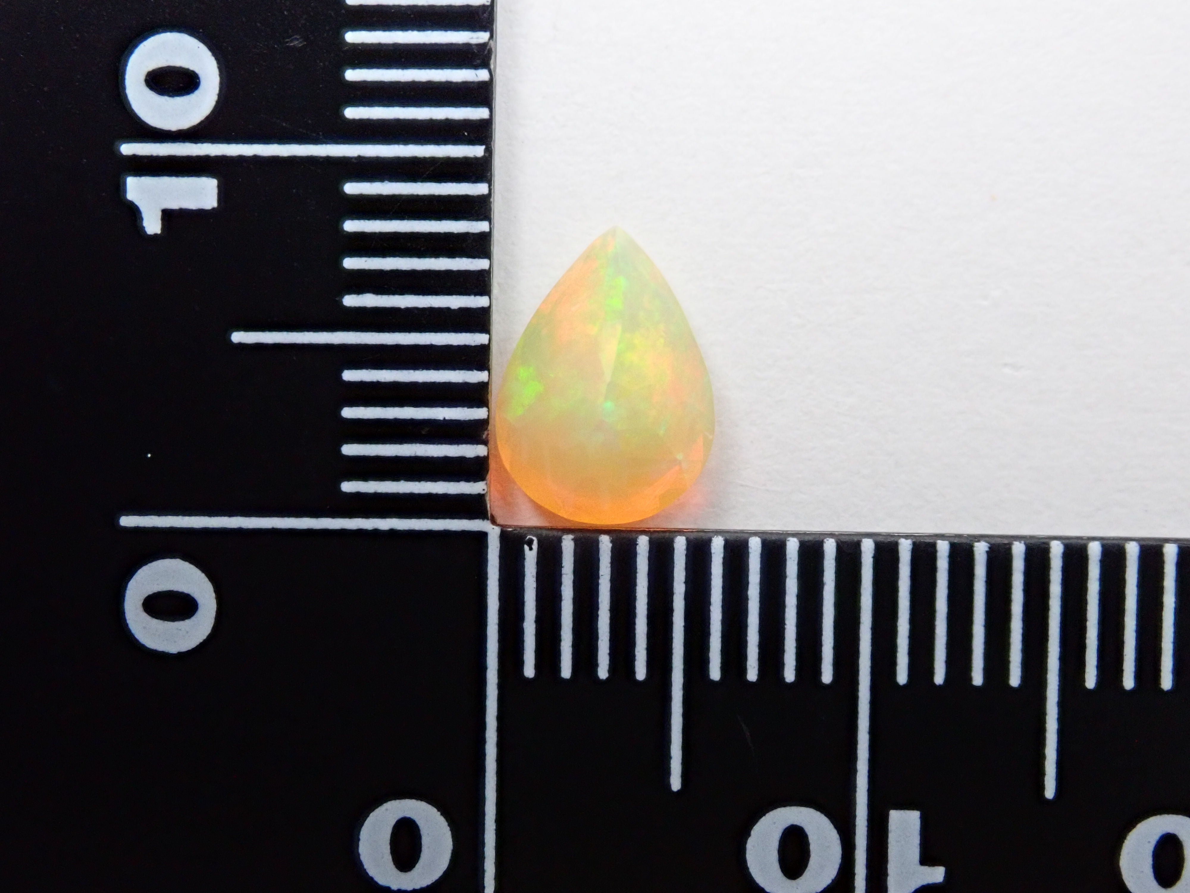 Fire opal 0.721ct loose (faceted cut)