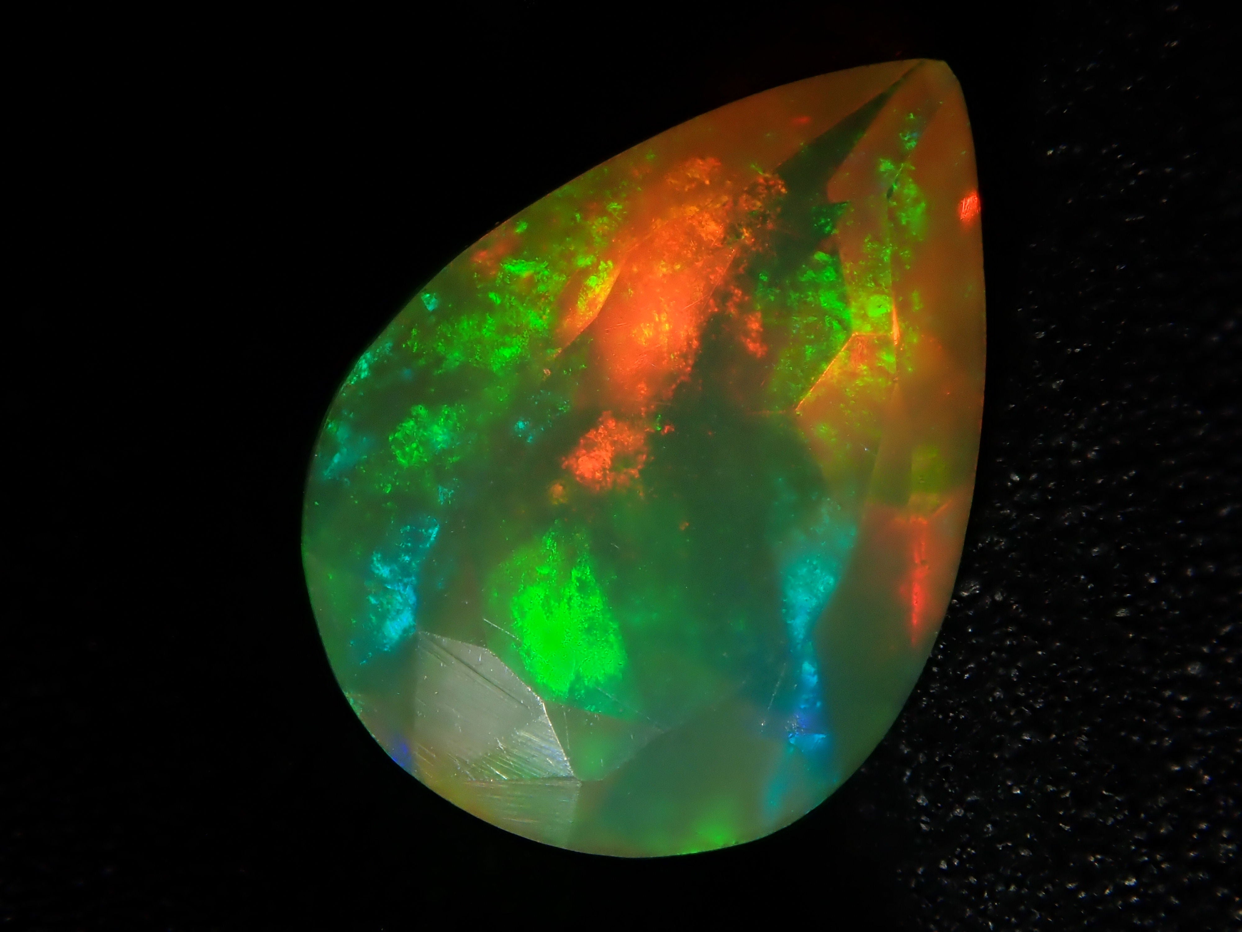 Fire opal 0.721ct loose (faceted cut)