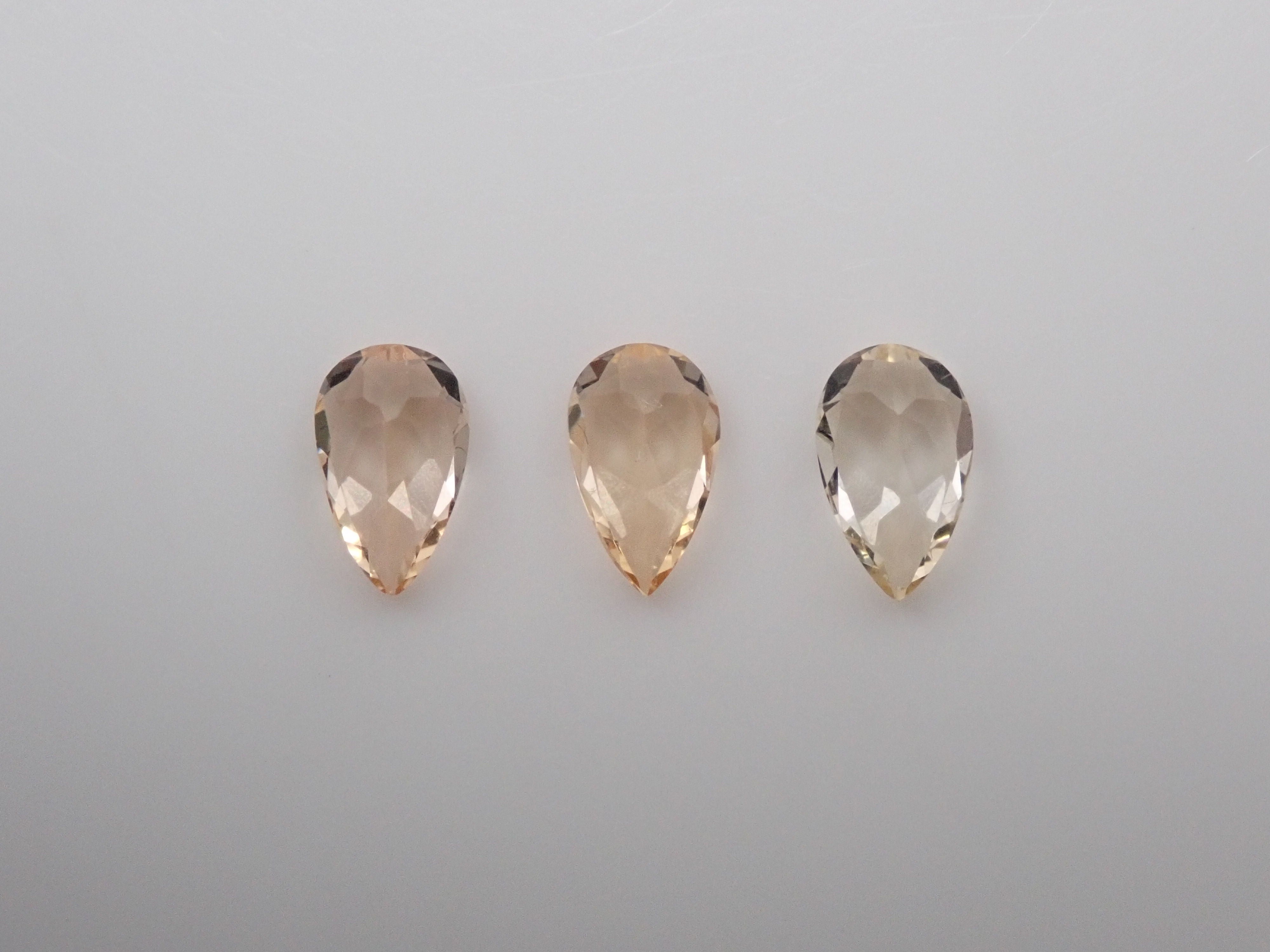 Imperial topaz 3 stone set 0.569ct