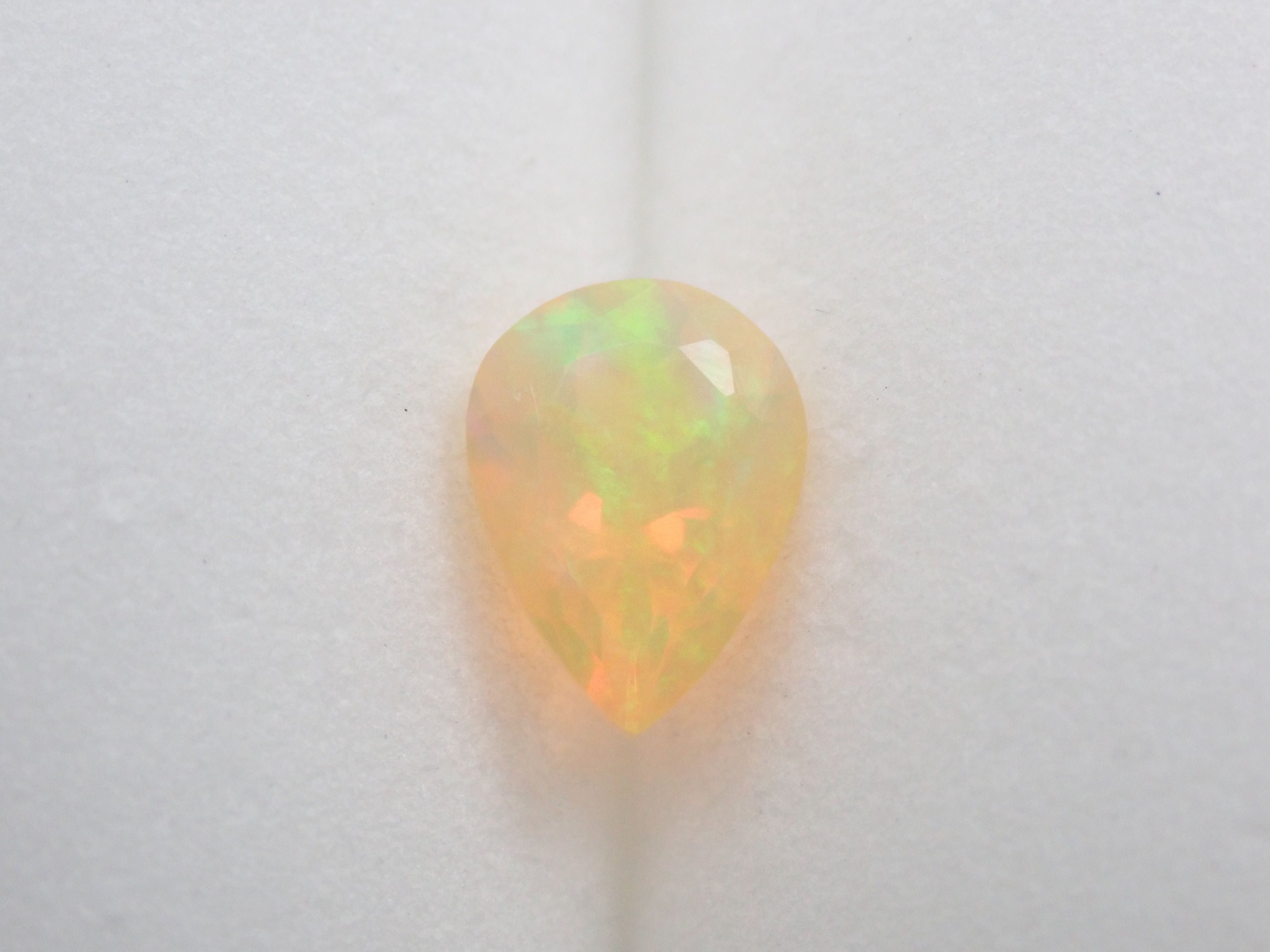 Fire opal 0.721ct loose (faceted cut)