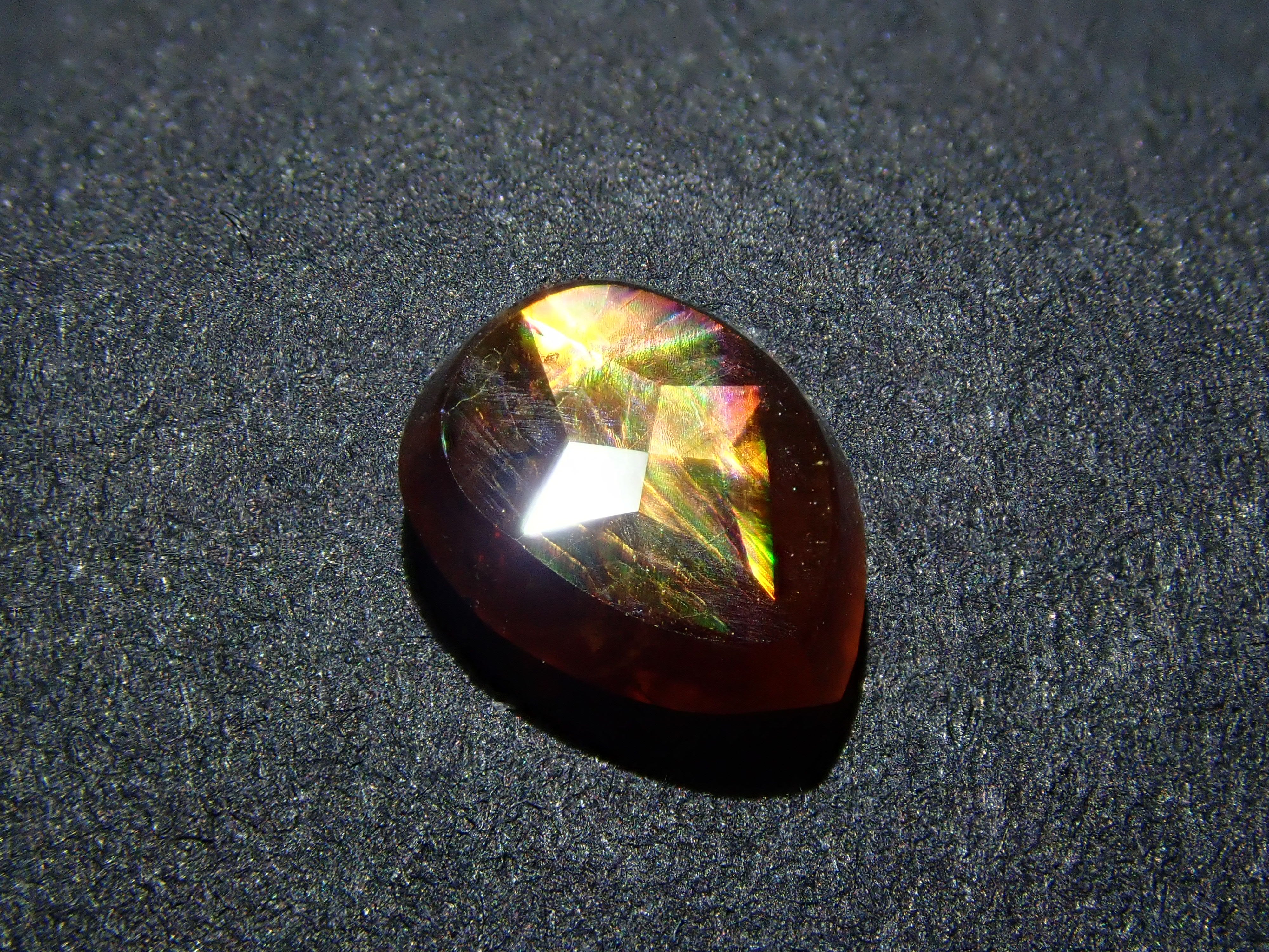 Andradite garnet (commonly known as rainbow garnet) 0.910ct rough stone