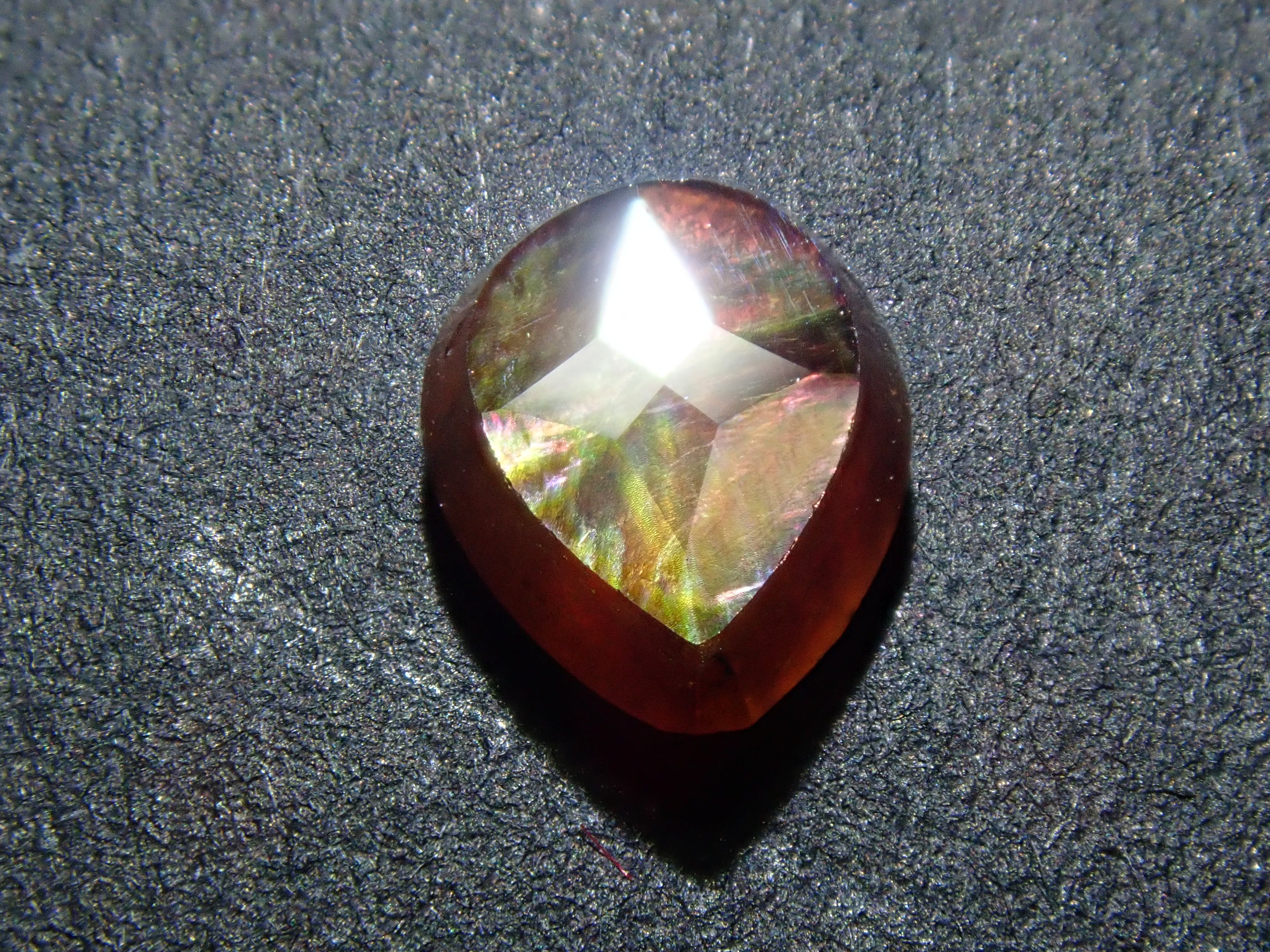 Andradite garnet (commonly known as rainbow garnet) 0.720ct rough stone