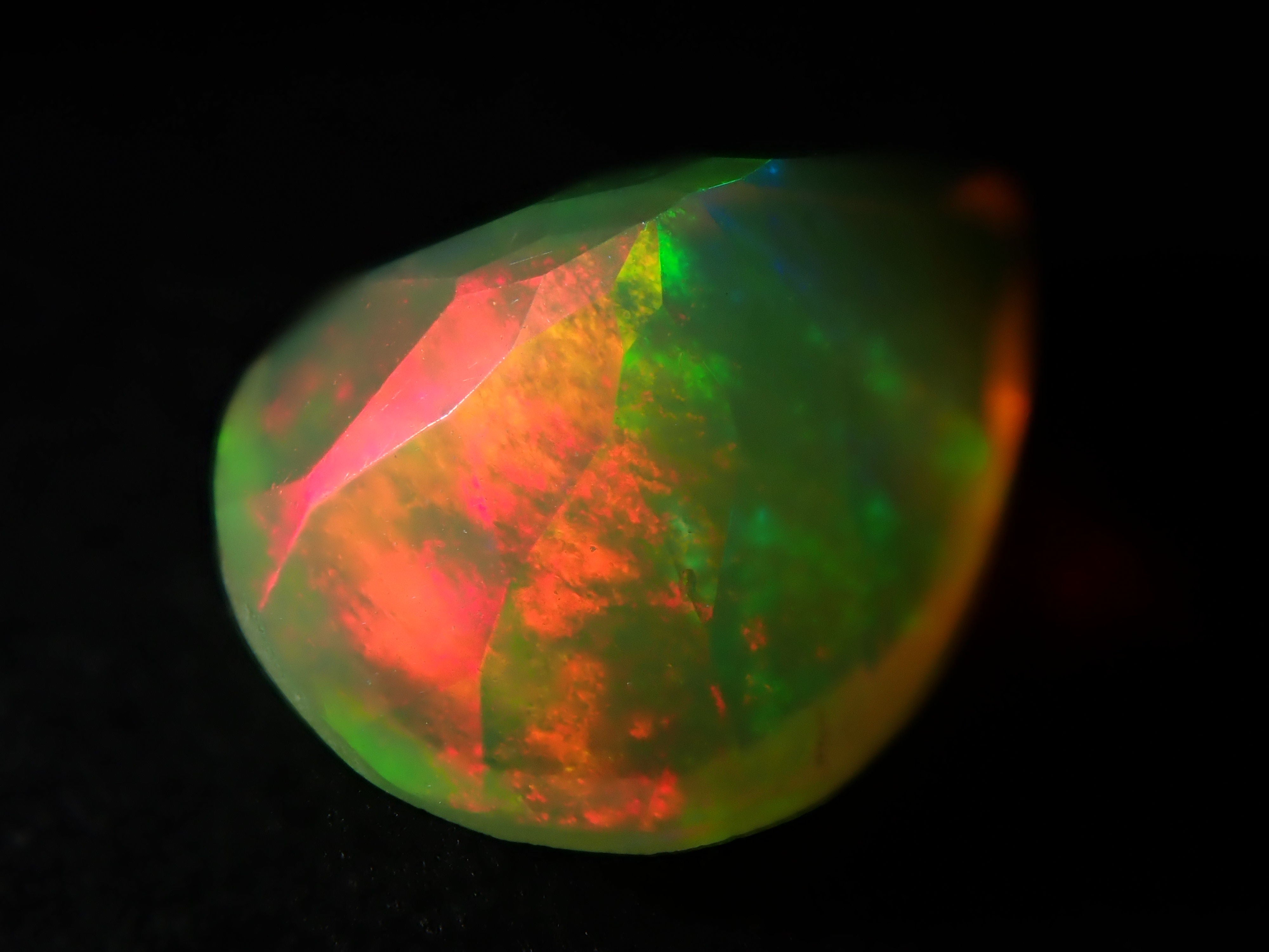 Fire opal 0.721ct loose (faceted cut)