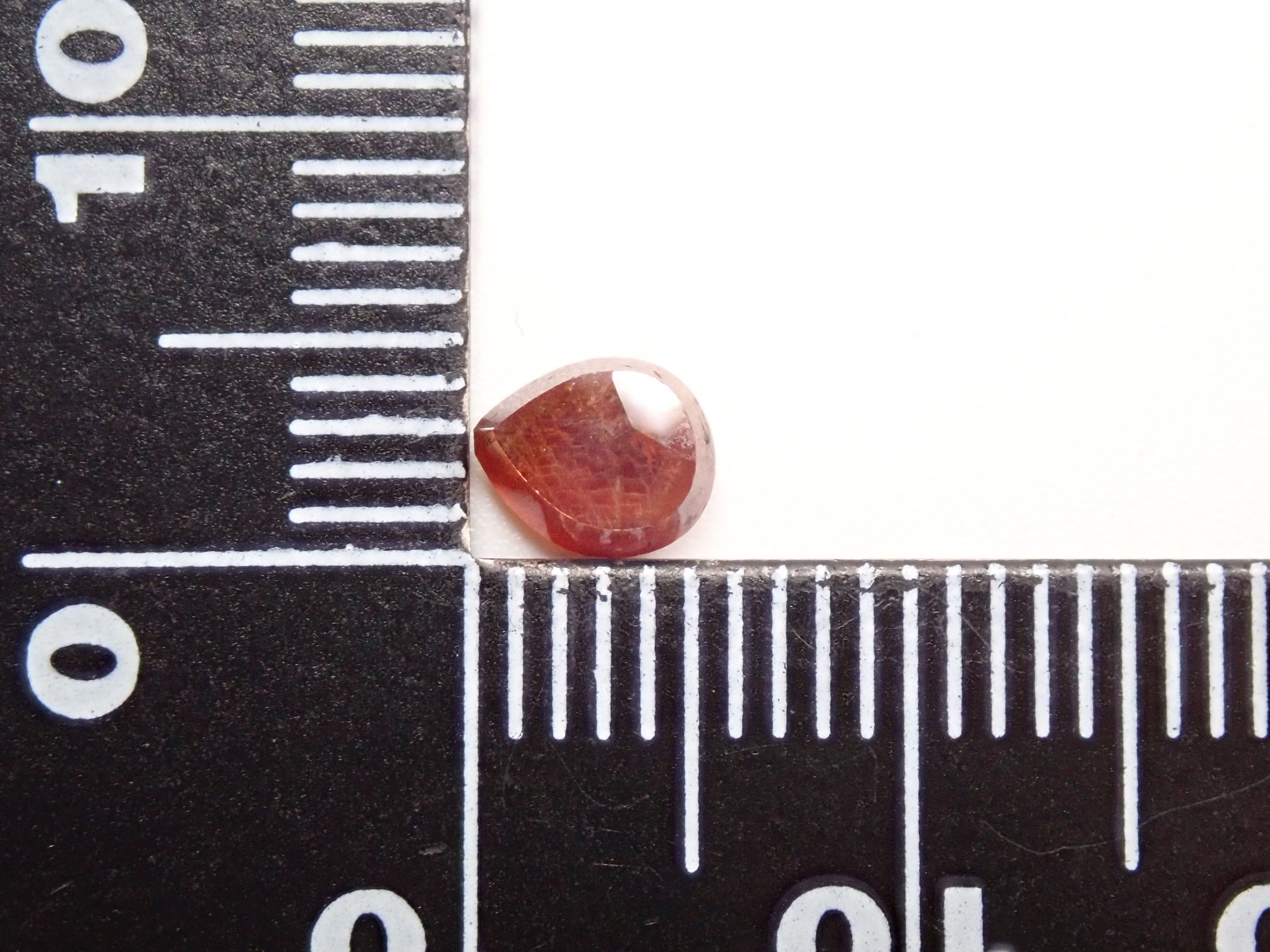 Andradite garnet (commonly known as rainbow garnet) 0.720ct rough stone