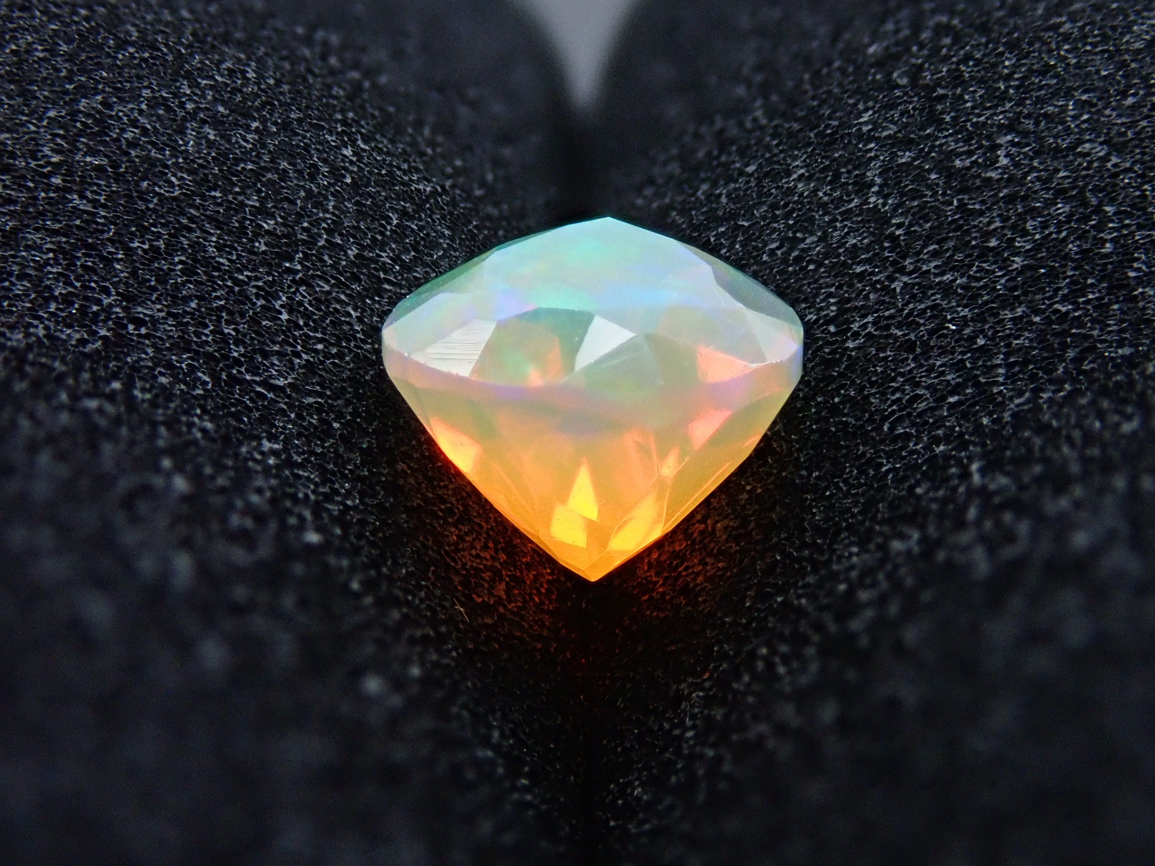 Fire opal 0.721ct loose (faceted cut)