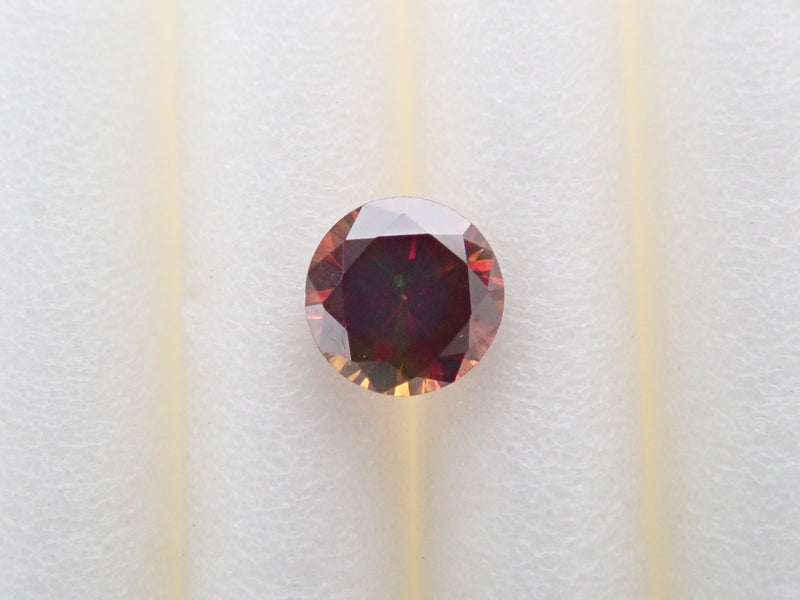 ファンシーレッドブラウンダイヤモンド（トリートメント,バイカラー蛍光） 3.3mm/0.144ctルース(FANCY RED BROWN, VS2)