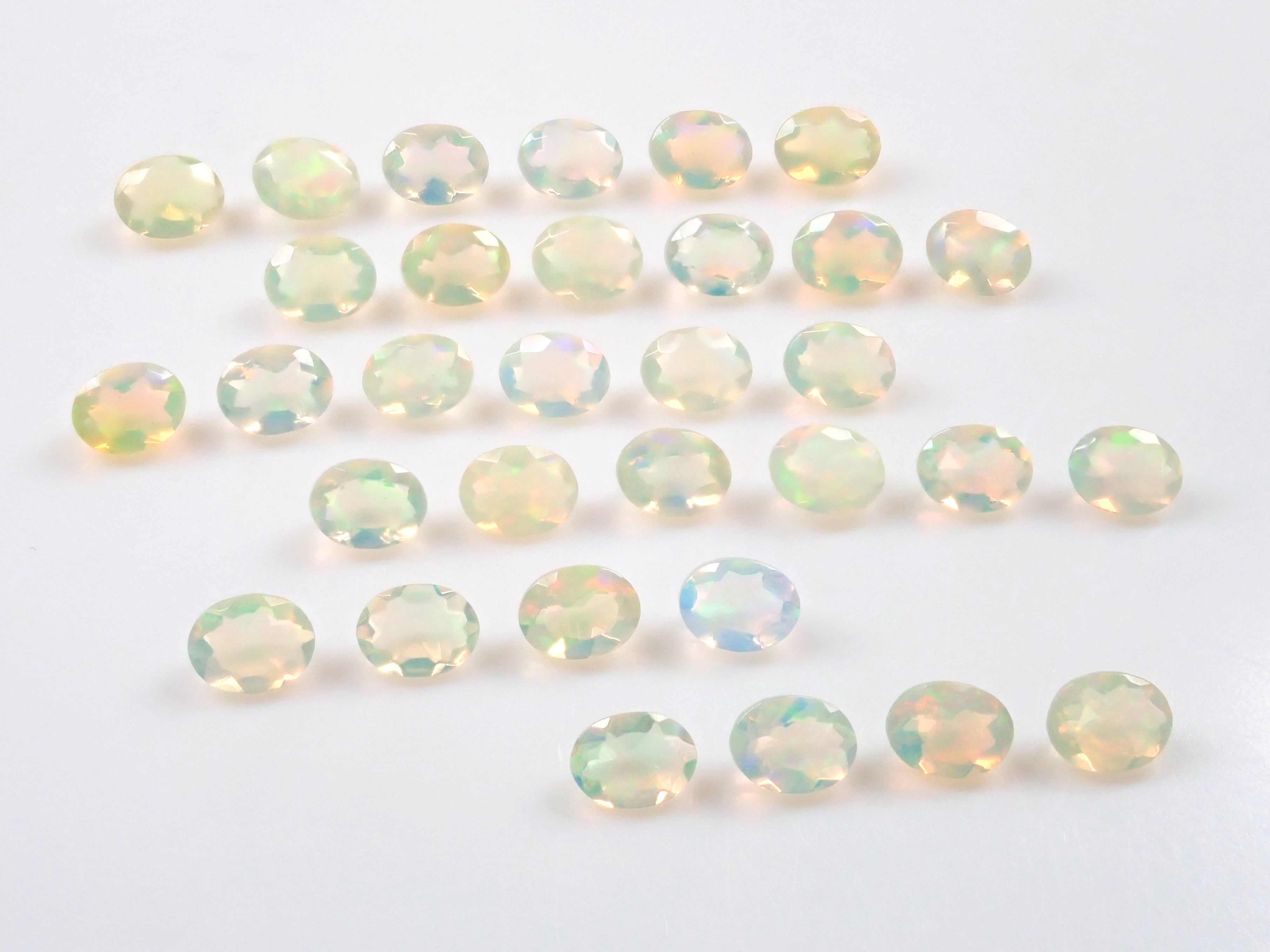 Ethiopian opal 1 stone (oval cut, 3 x 4 mm) loose (discount available for multiple purchases)