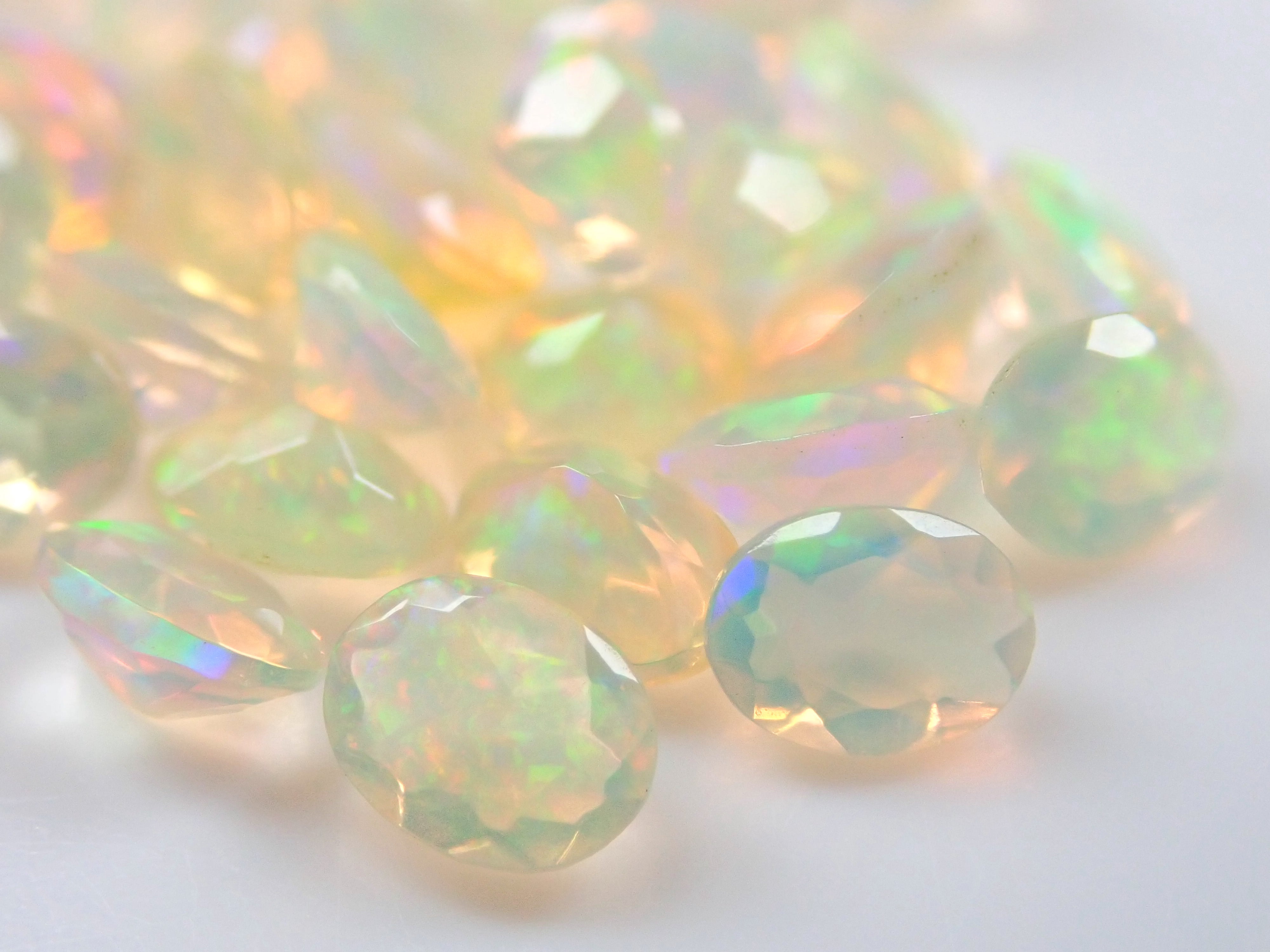 Ethiopian opal 1 stone (oval cut, 3 x 4 mm) loose (discount available for multiple purchases)