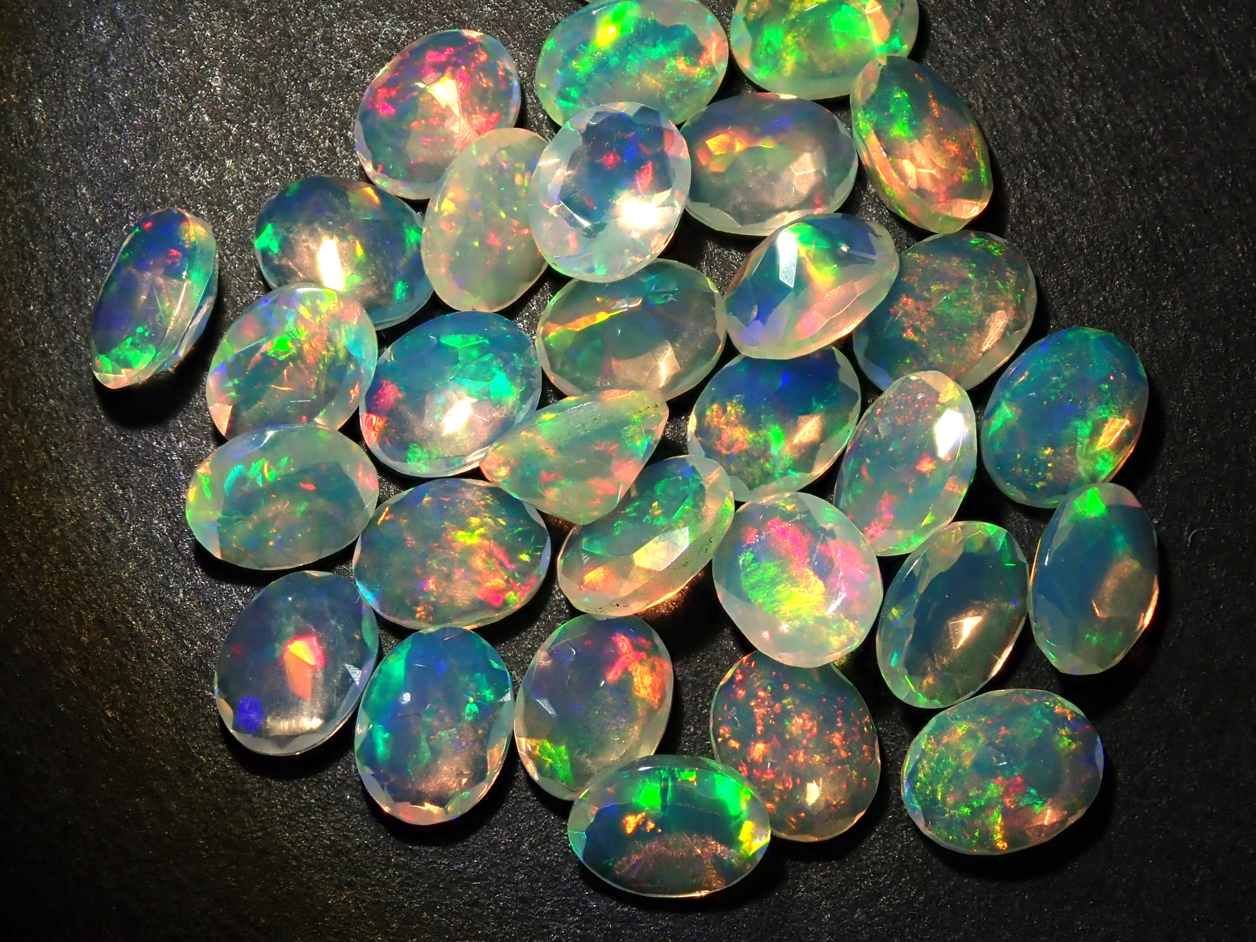 Ethiopian opal 1 stone (oval cut, 3 x 4 mm) loose (discount available for multiple purchases)