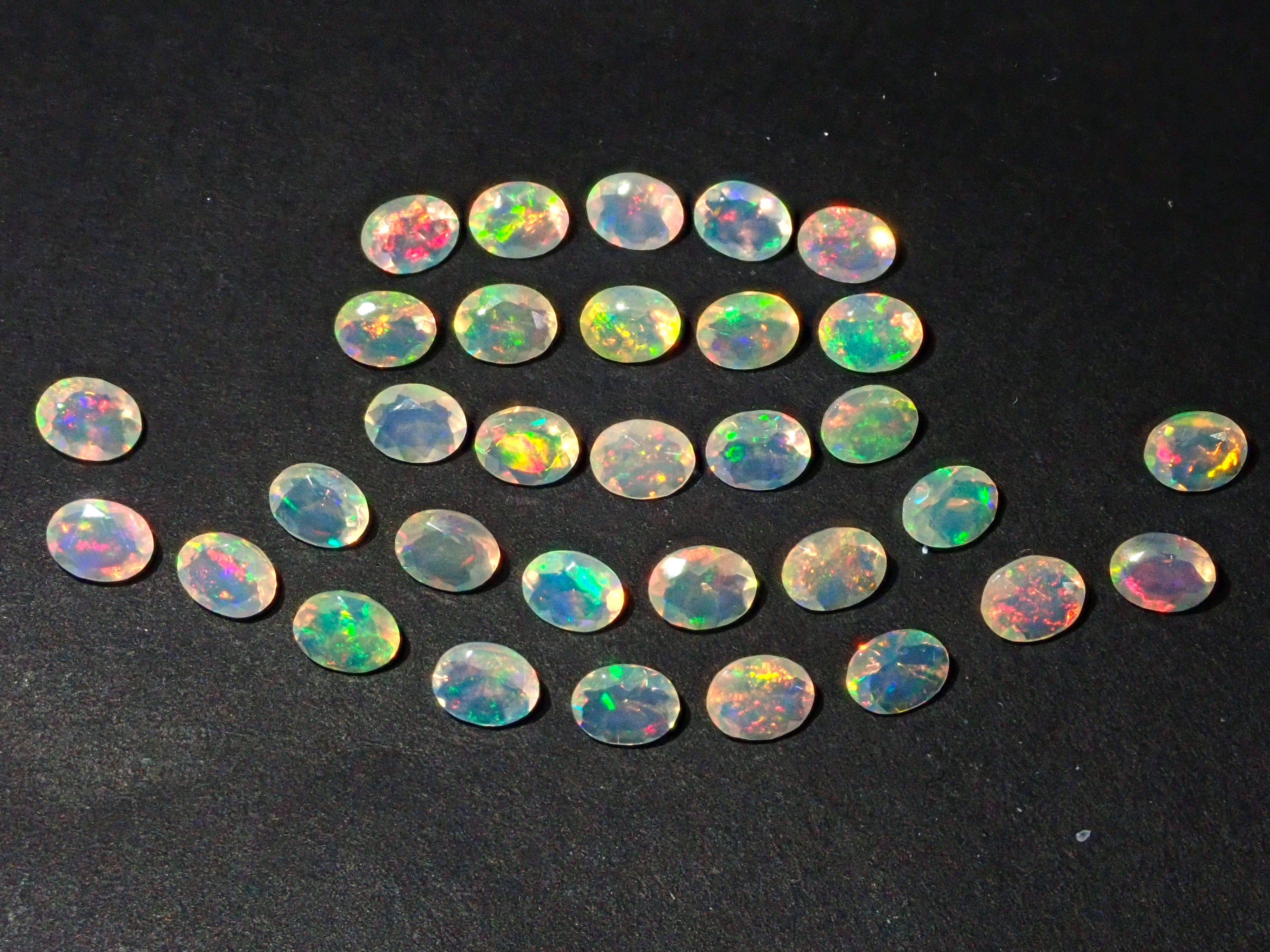 Ethiopian opal 1 stone (oval cut, 3 x 4 mm) loose (discount available for multiple purchases)