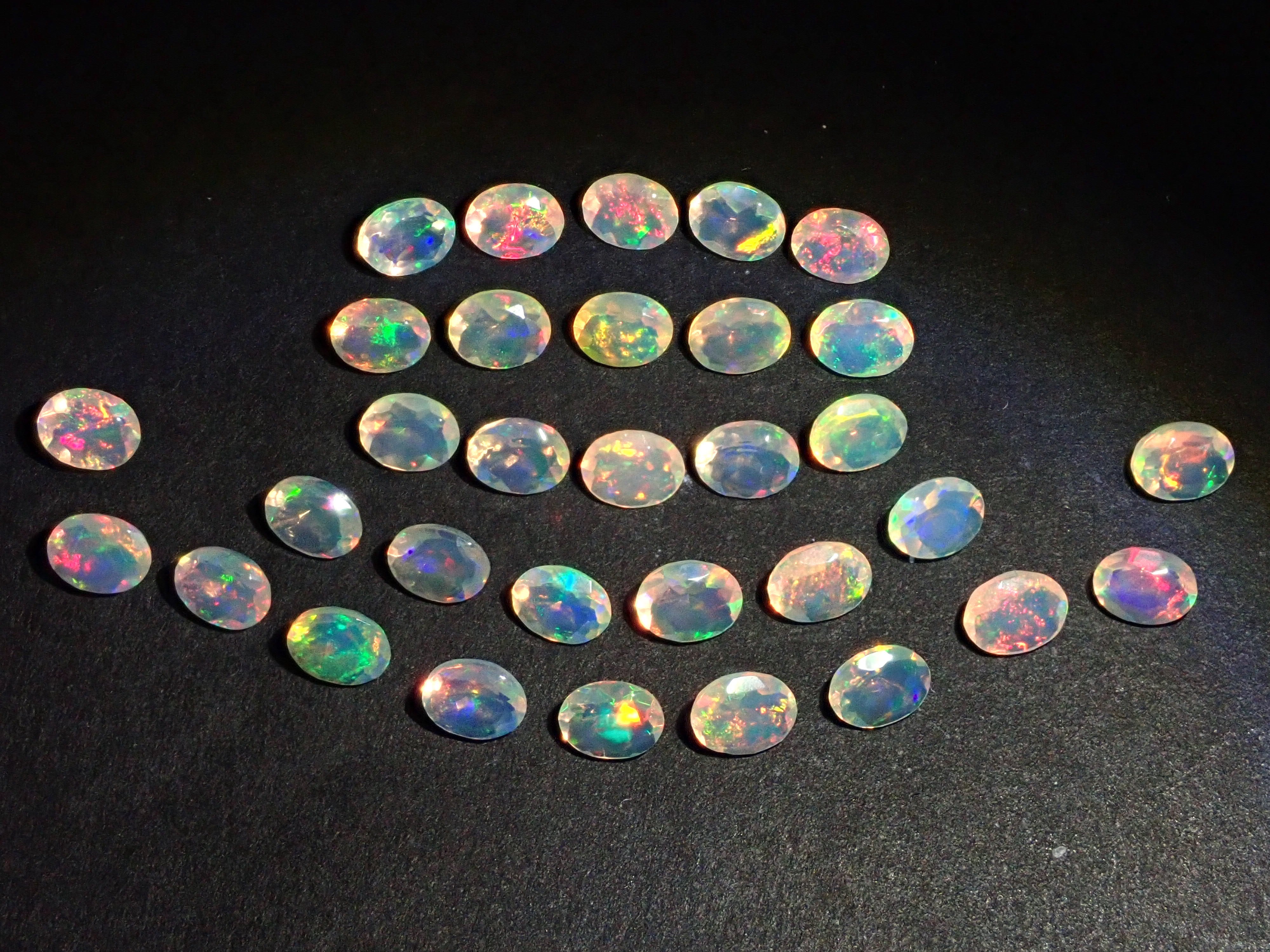 Ethiopian opal 1 stone (oval cut, 3 x 4 mm) loose (discount available for multiple purchases)