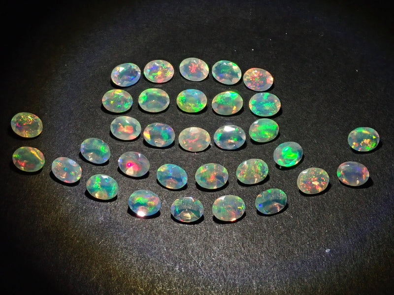 Ethiopian opal 1 stone (oval cut, 3 x 4 mm) loose (discount available for multiple purchases)