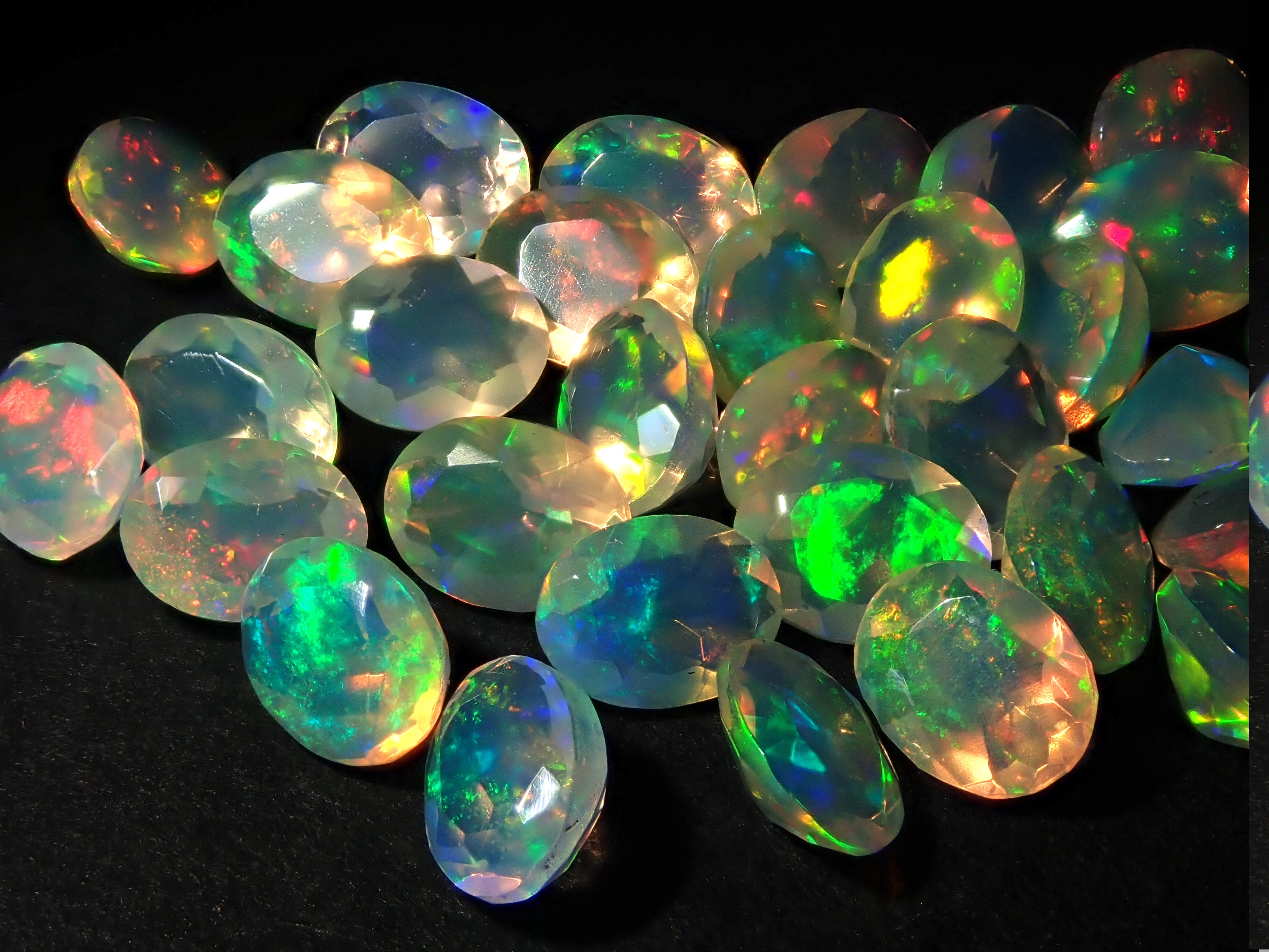 Ethiopian opal 1 stone (oval cut, 3 x 4 mm) loose (discount available for multiple purchases)