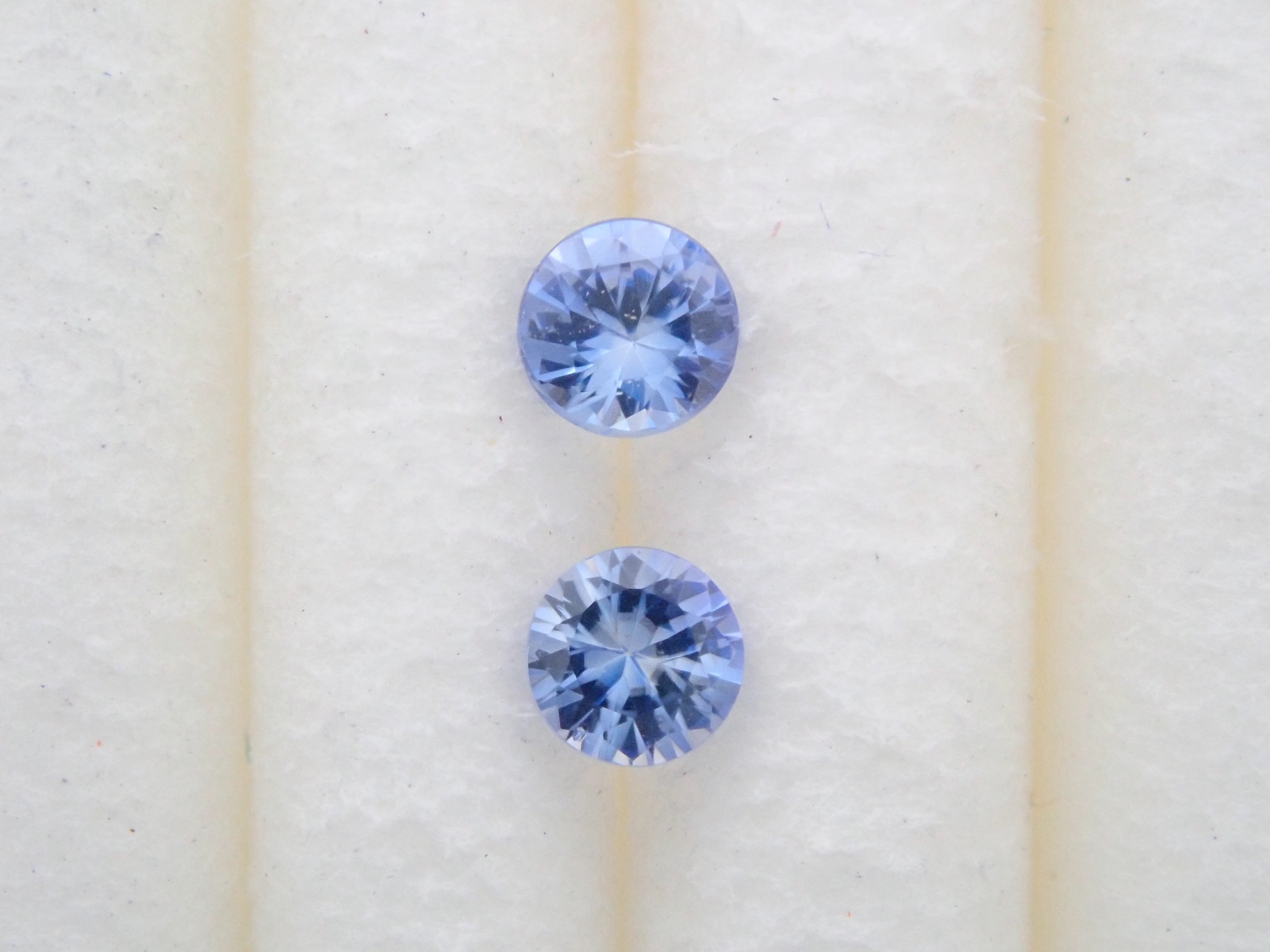 Benitoite 2 stone set 2.2mm/0.109ct loose