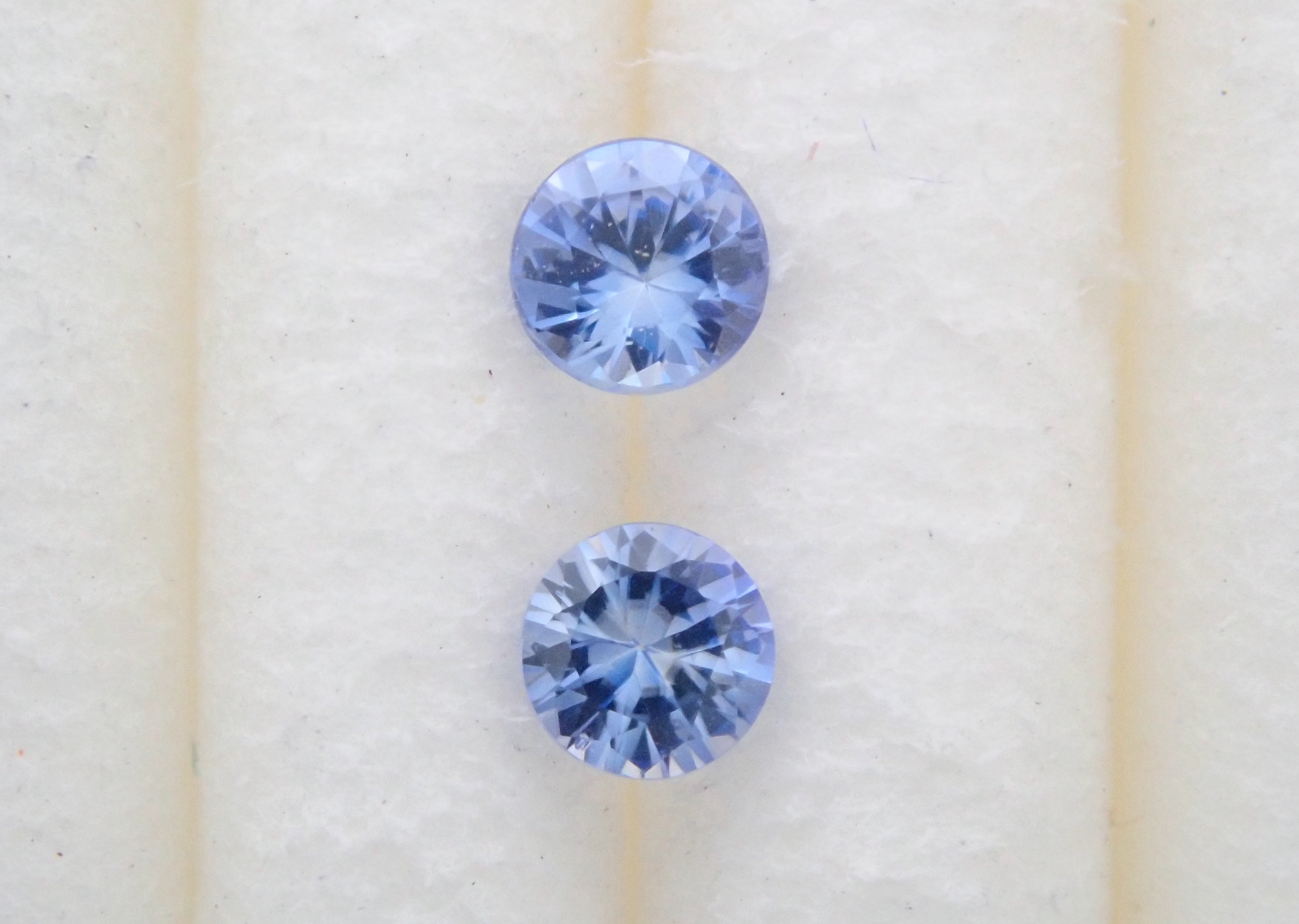 Benitoite 2 stone set 2.2mm/0.109ct loose