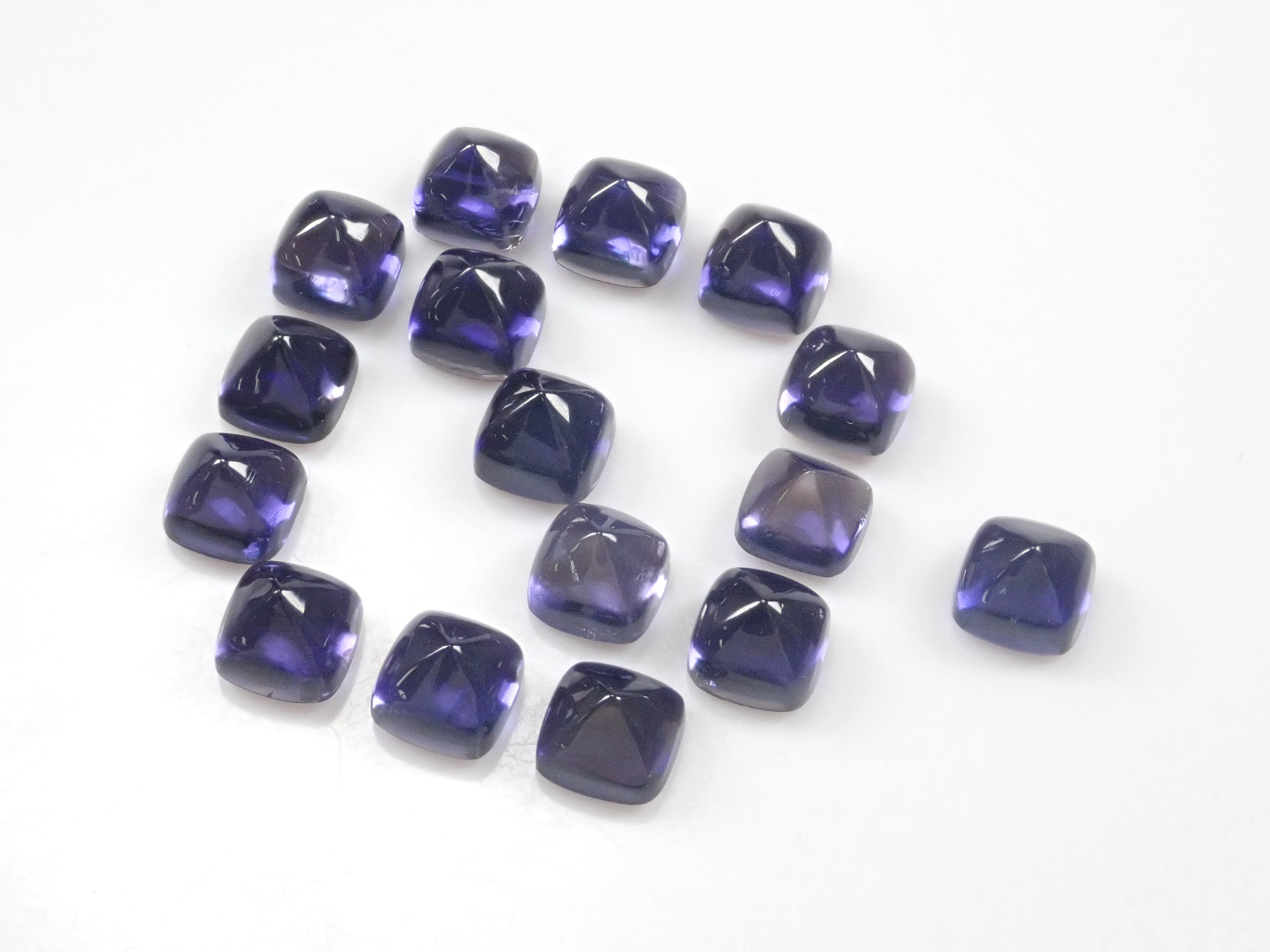 1 sugar loaf cut iolite 5mm