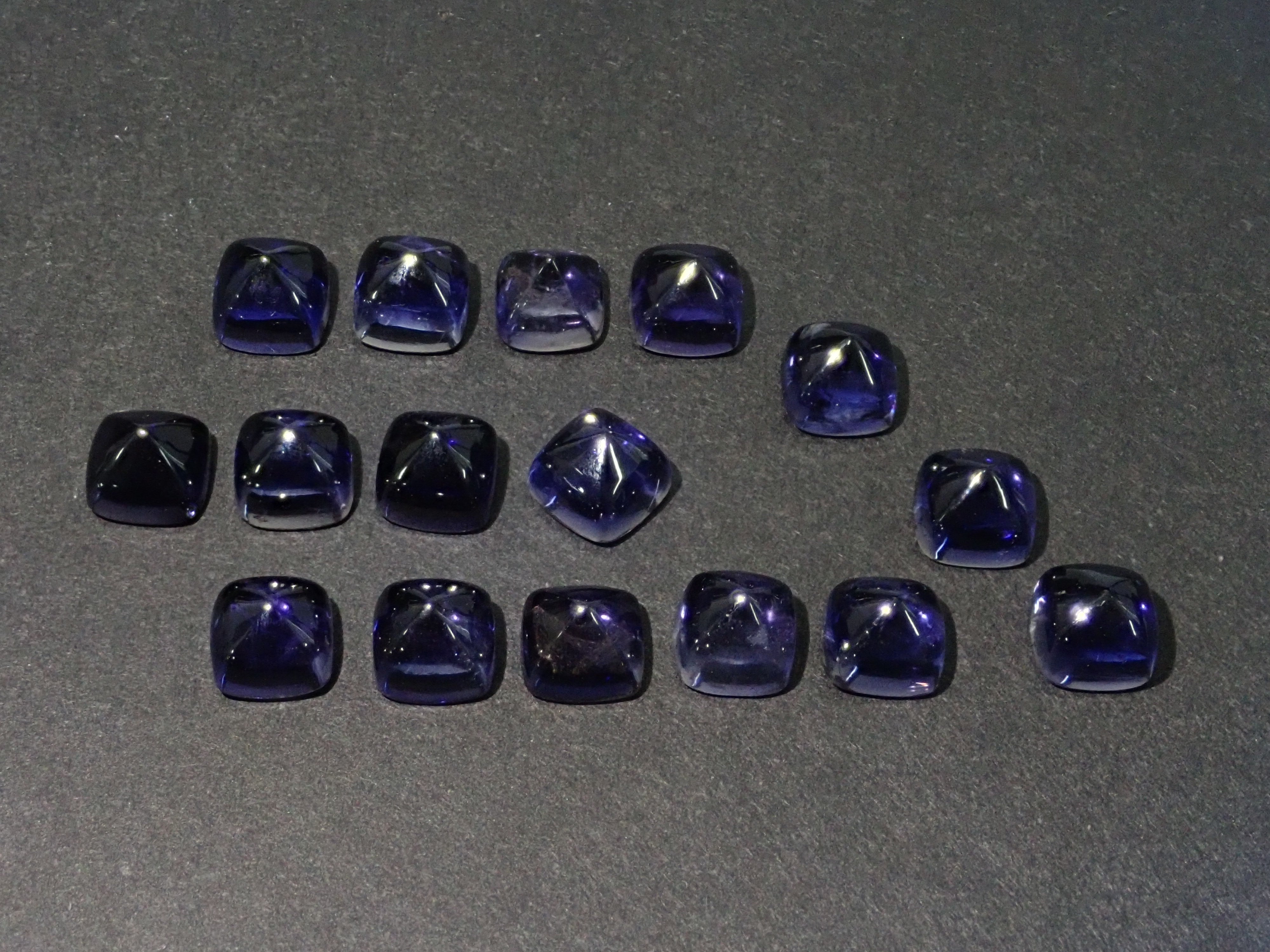 1 sugar loaf cut iolite 5mm