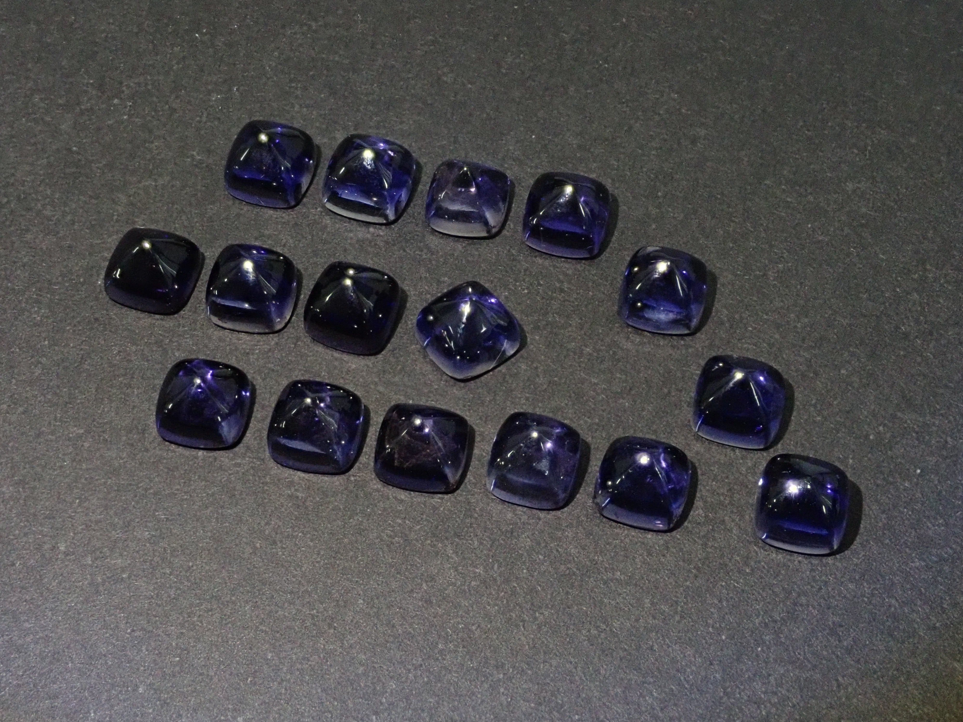 1 sugar loaf cut iolite 5mm