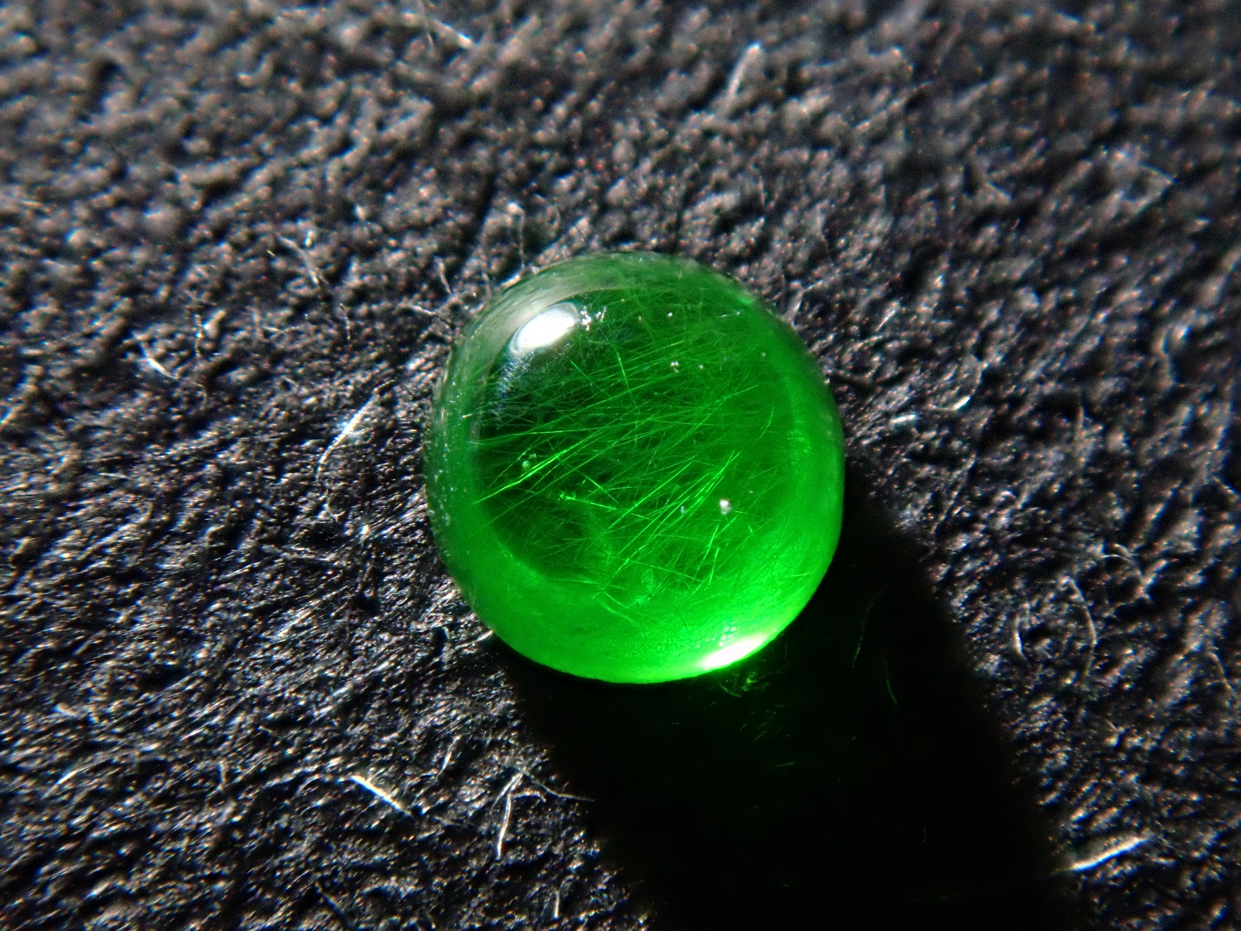 Russian demantoid garnet (horsetail recognized) 2mm/0.055ct loose