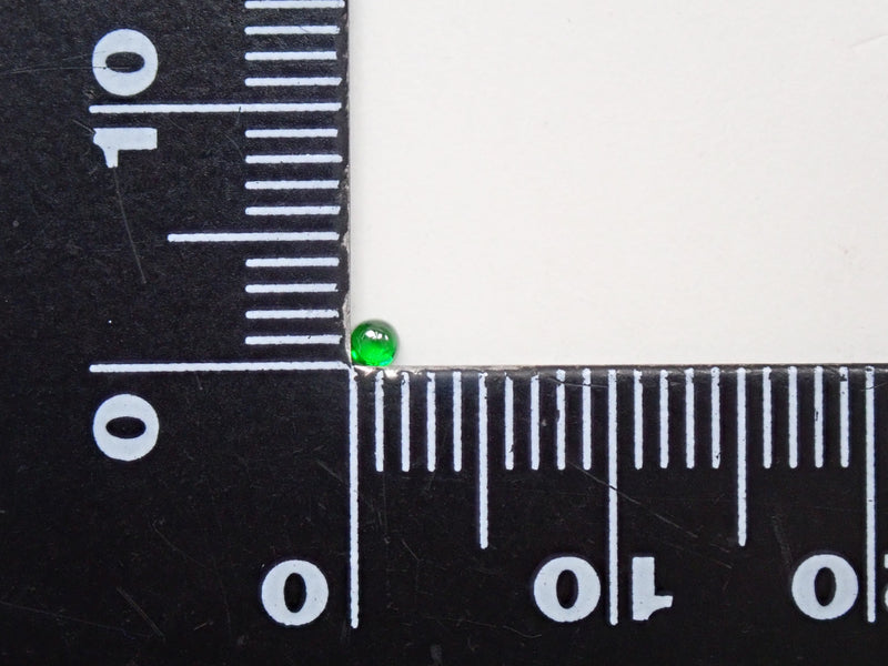 Russian demantoid garnet (horsetail recognized) 2mm/0.057ct loose