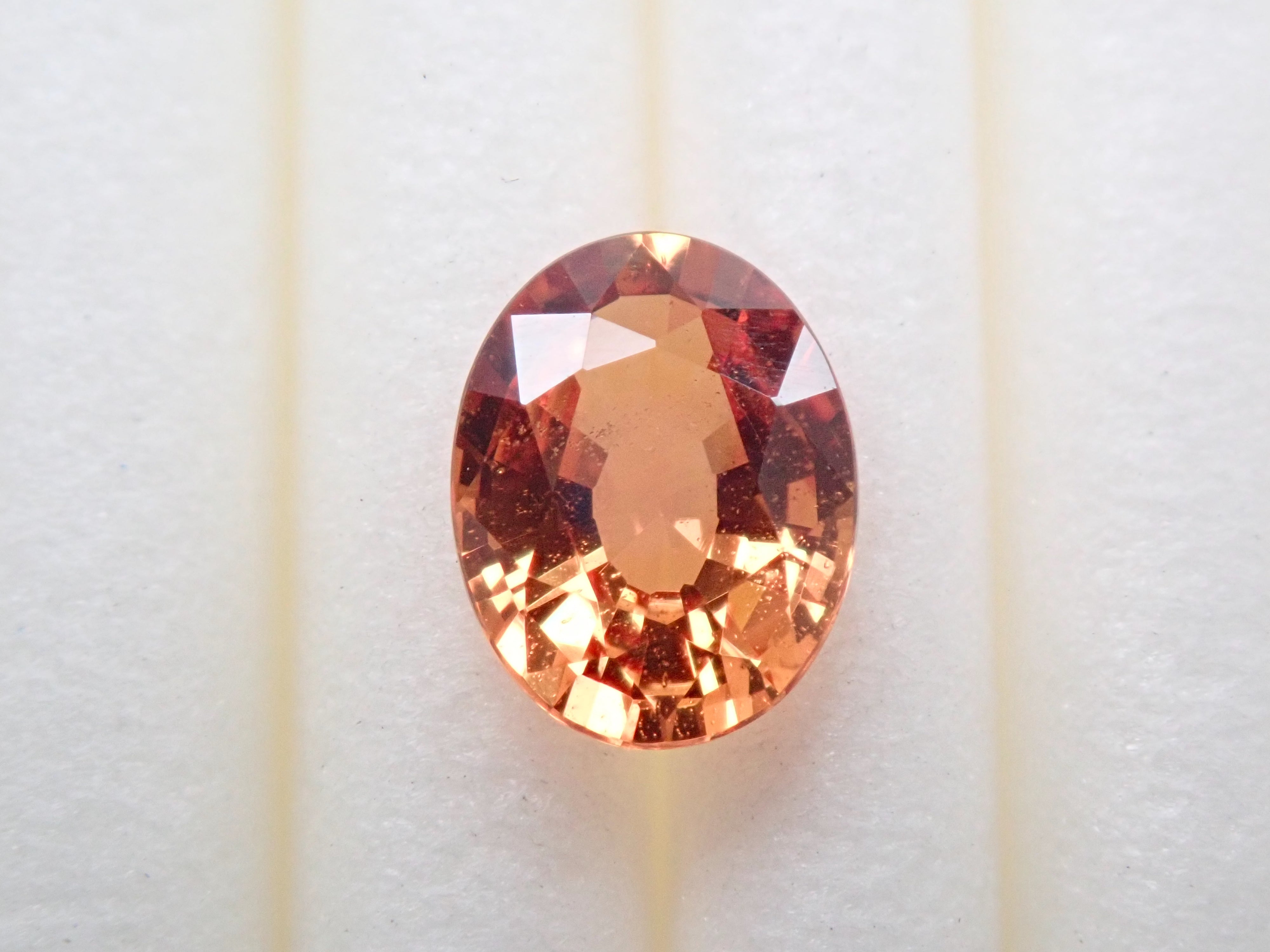 Padparadscha sapphire 0.676ct loose medium treasure book