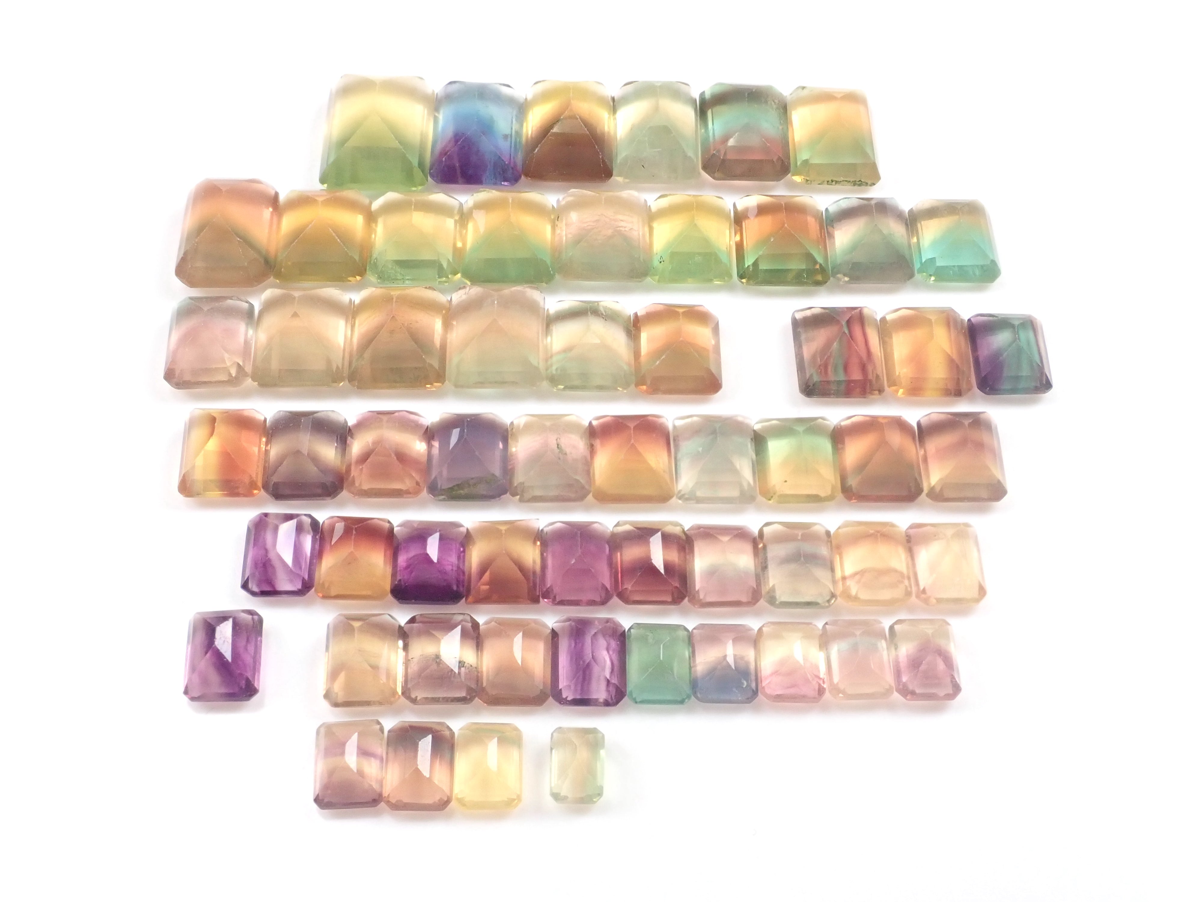 Rainbow fluorite (bicolor/tricolor) parent and child 2 stone set (average 13ct)