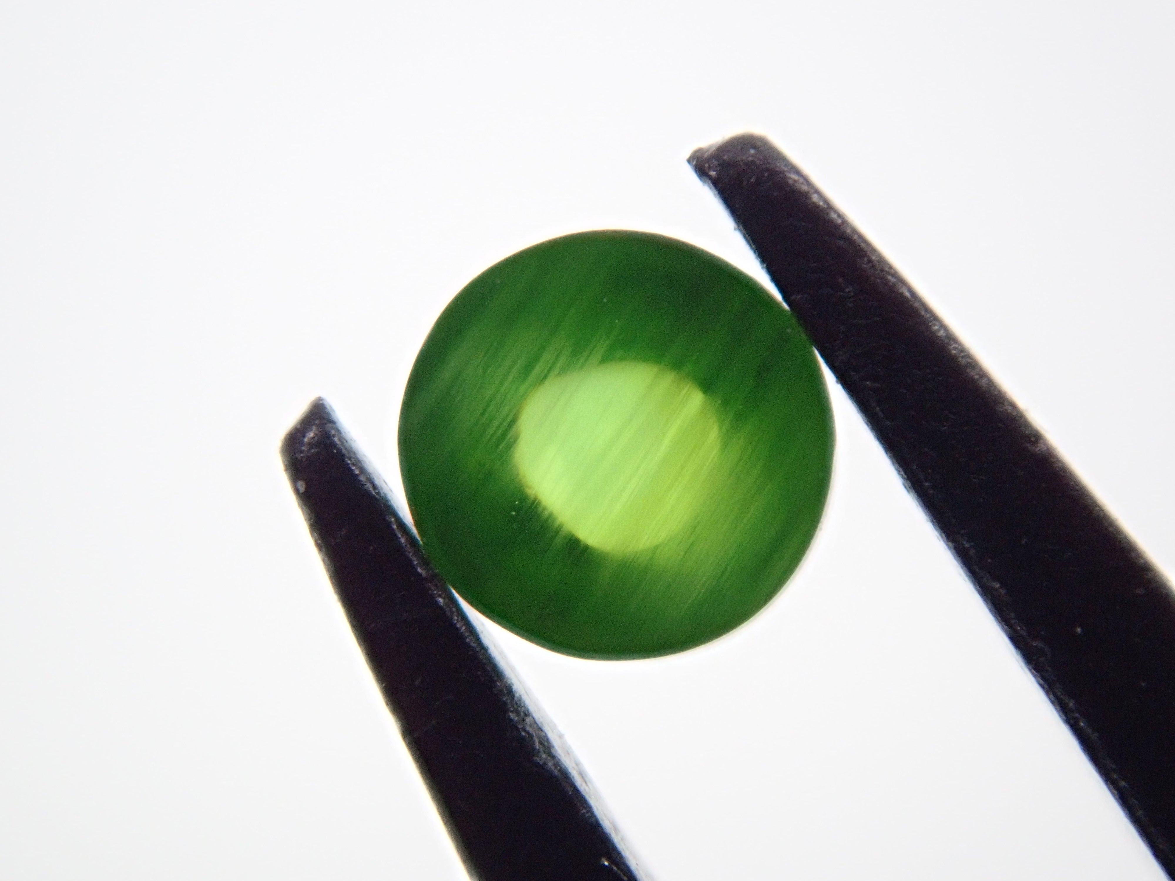 Russian demantoid garnet cat's eye (horsetail recognized) 0.138ct loose