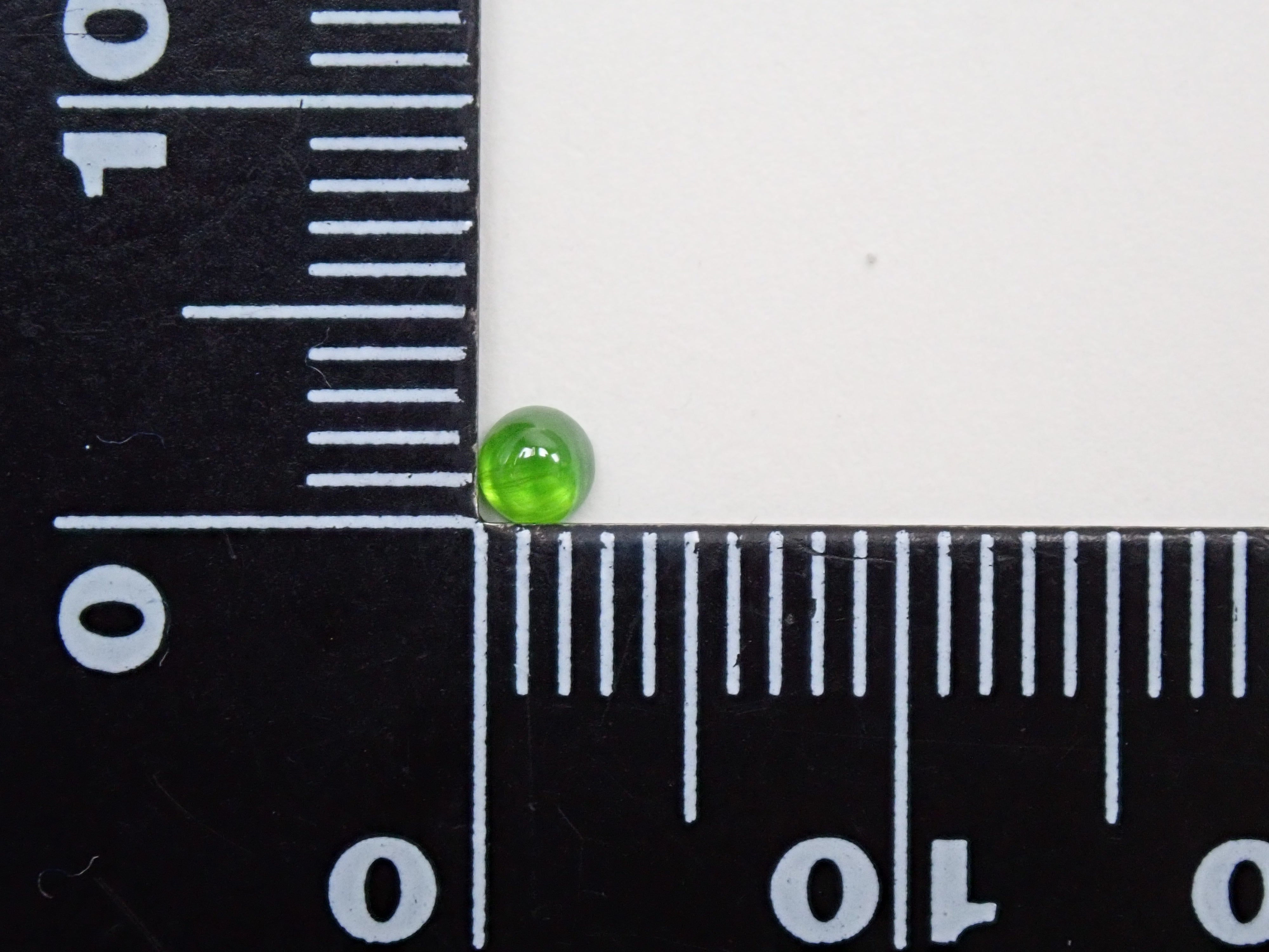 Russian demantoid garnet cat's eye (horsetail recognized) 0.138ct loose