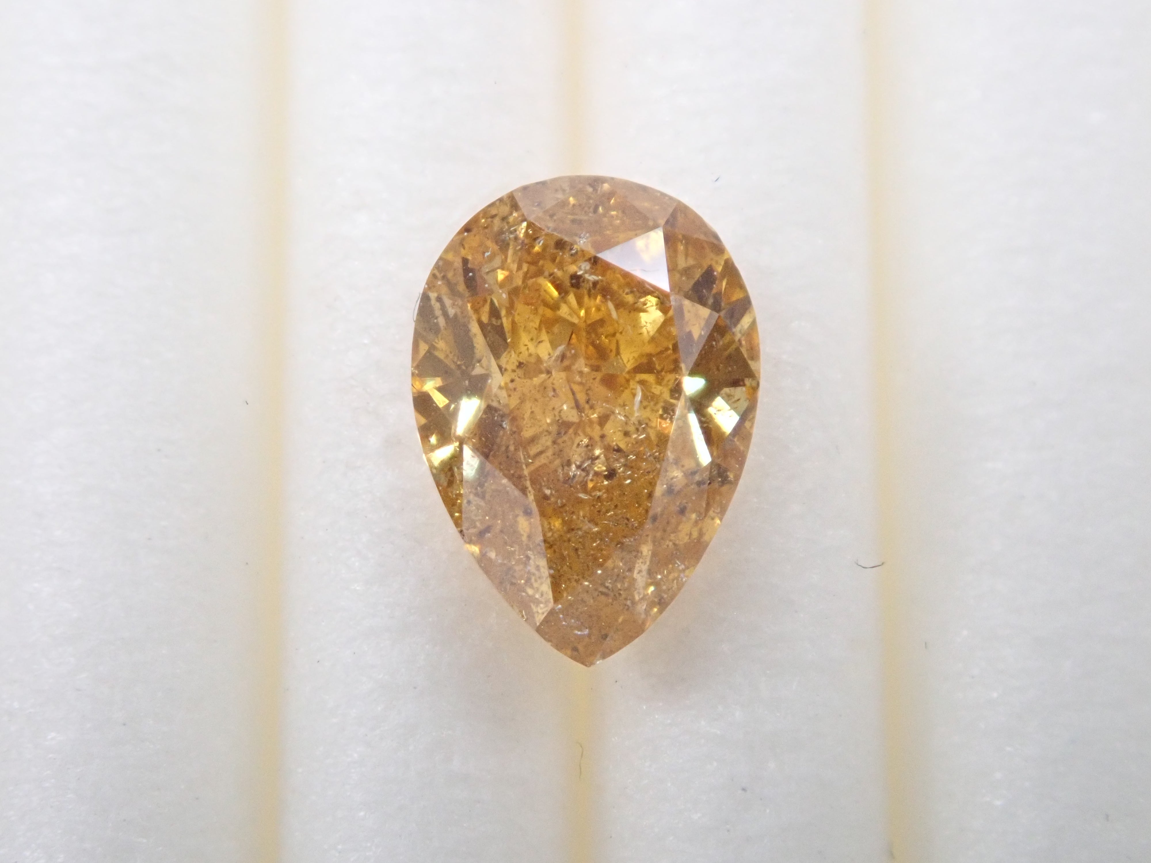 イエローダイヤモンド 0.706ctルース(FANCY DEEP ORANGY YELLOW, I-1)