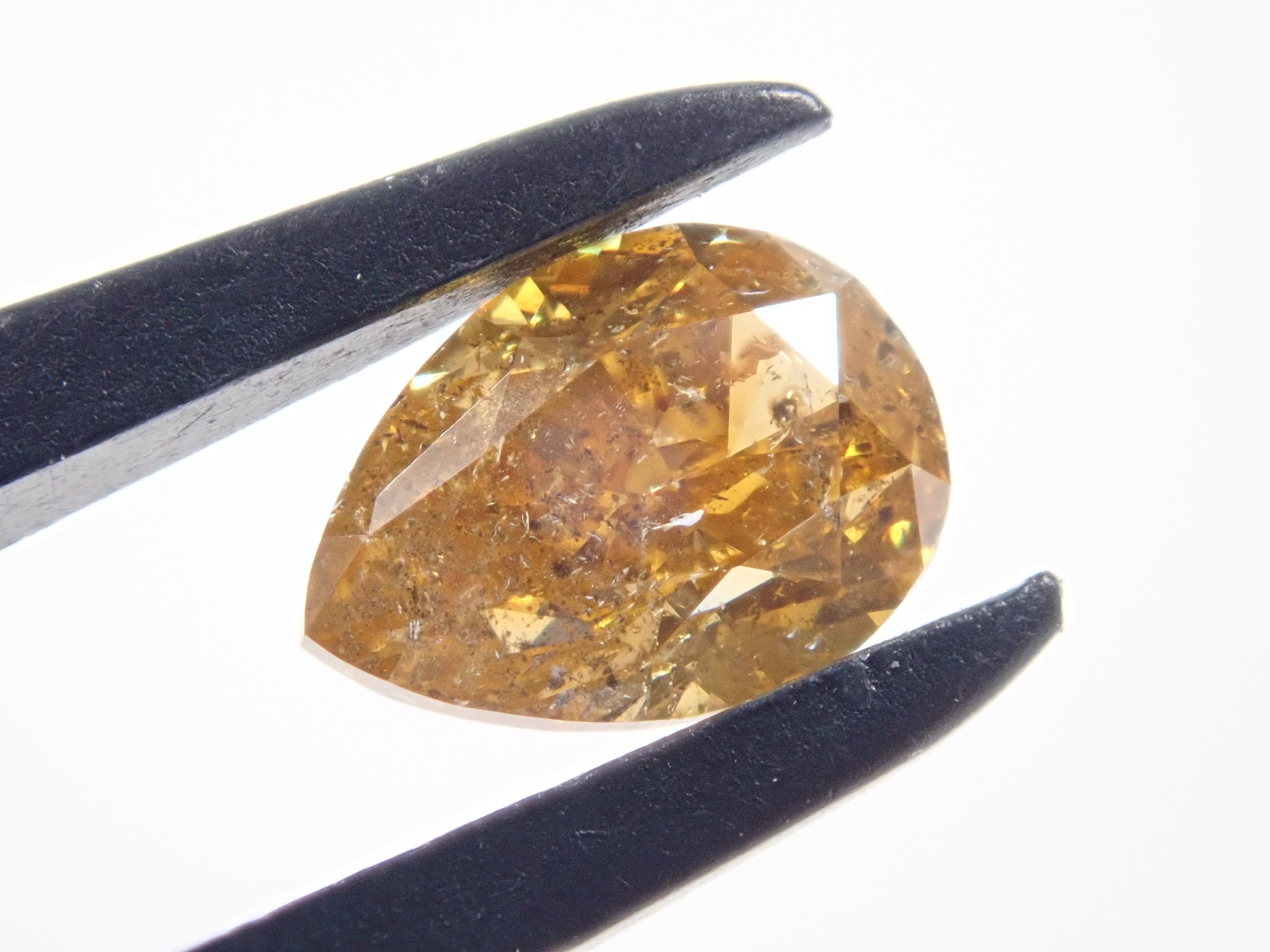 イエローダイヤモンド 0.706ctルース(FANCY DEEP ORANGY YELLOW, I-1)