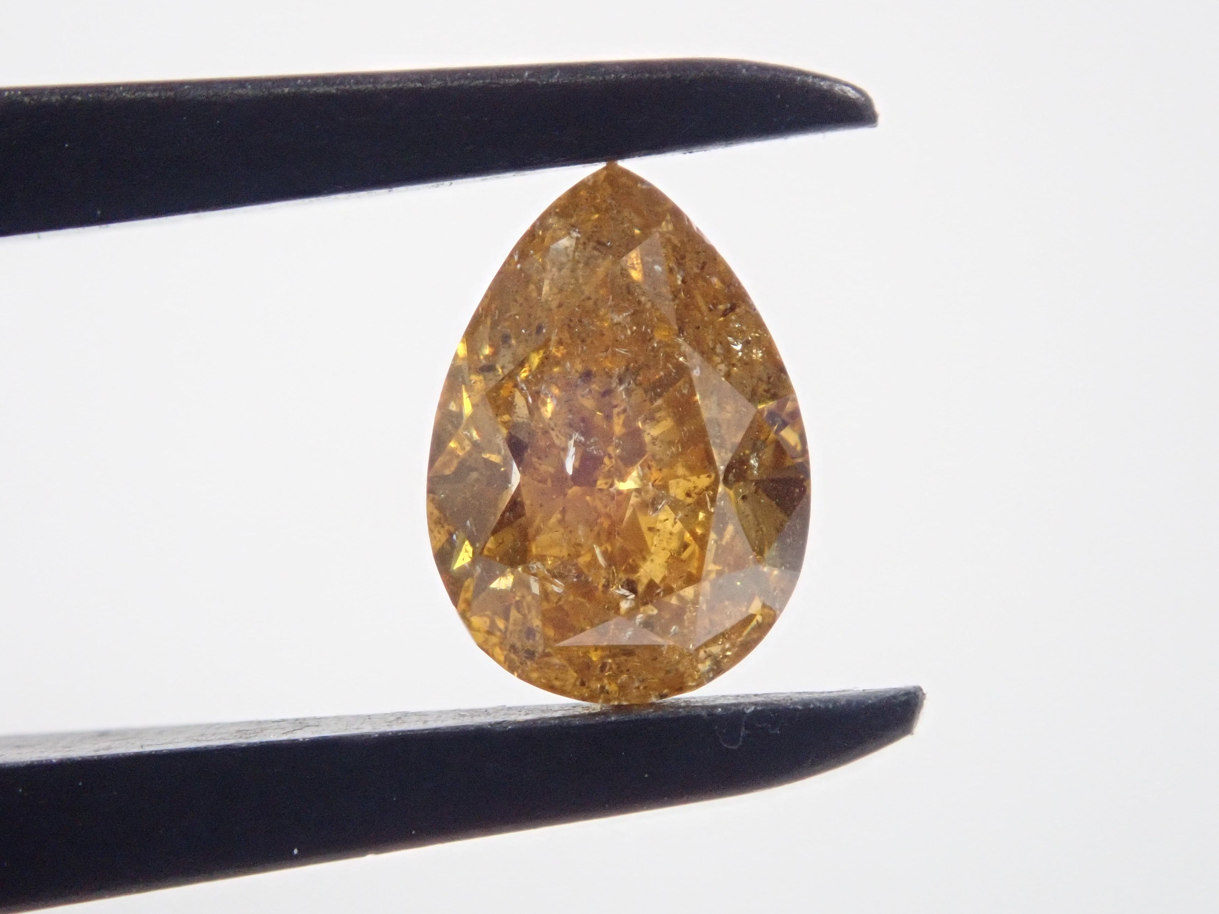 イエローダイヤモンド 0.706ctルース(FANCY DEEP ORANGY YELLOW, I-1)