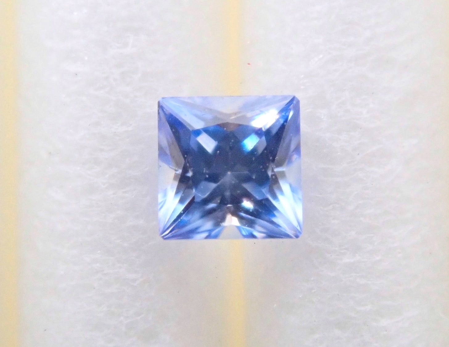 Benitoite 0.103ct loose (princess cut)