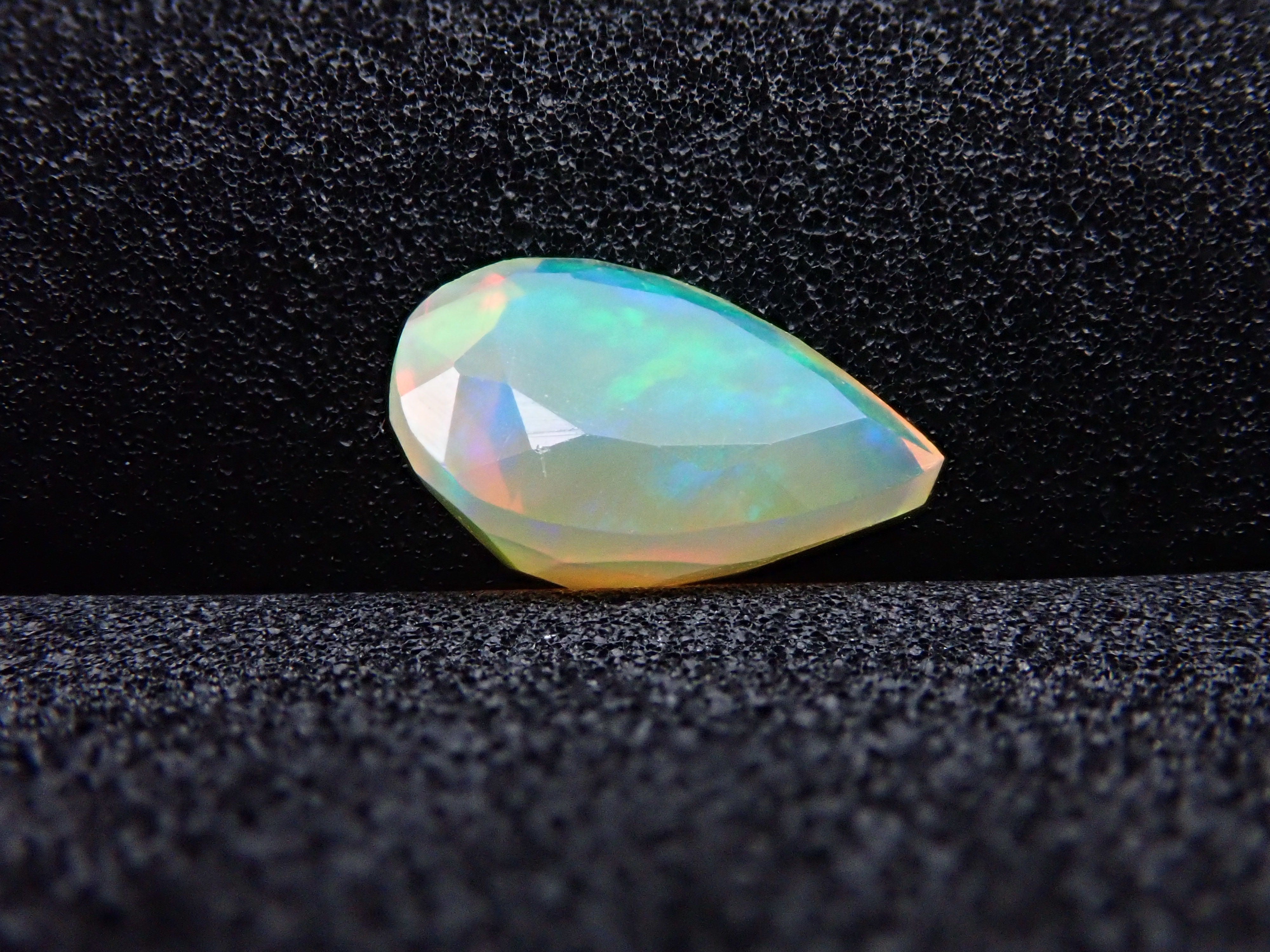 Fire opal 0.721ct loose (faceted cut)