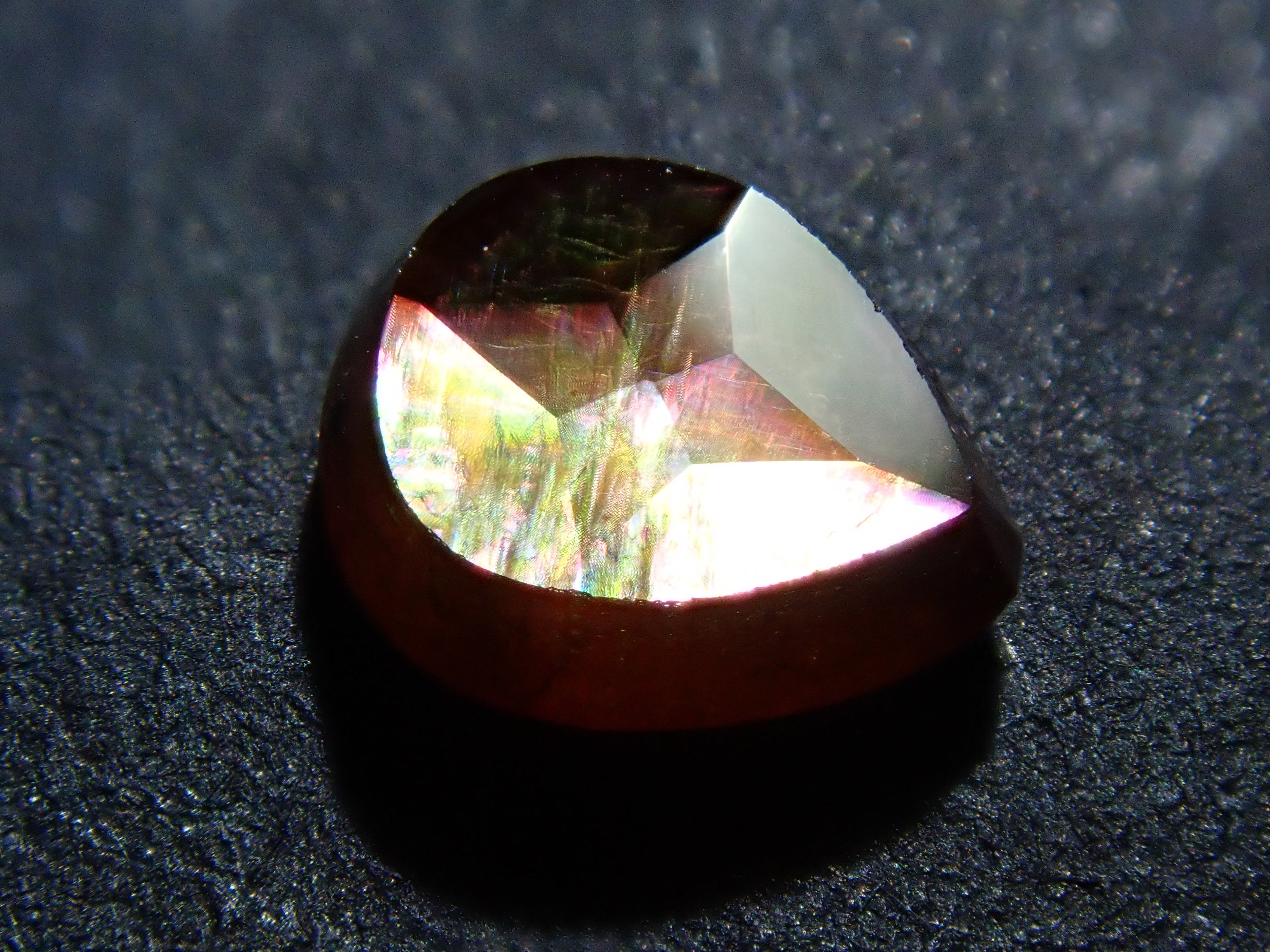 Andradite garnet (commonly known as rainbow garnet) 0.720ct rough stone