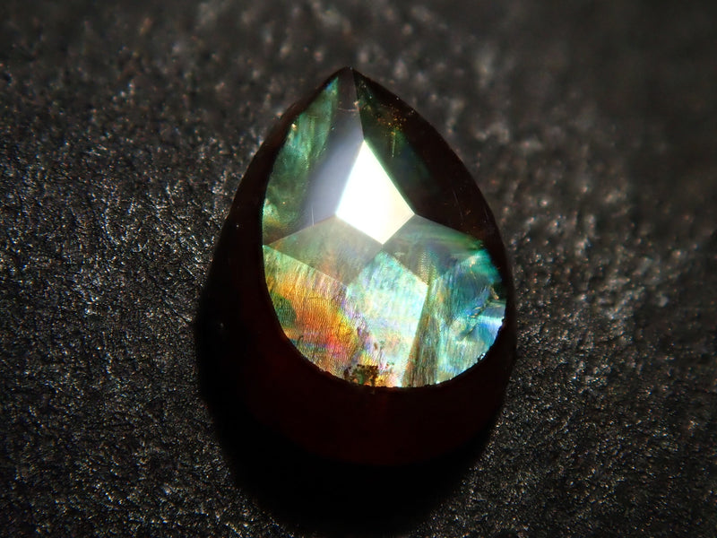 Andradite garnet (commonly known as rainbow garnet) 0.517ct rough stone