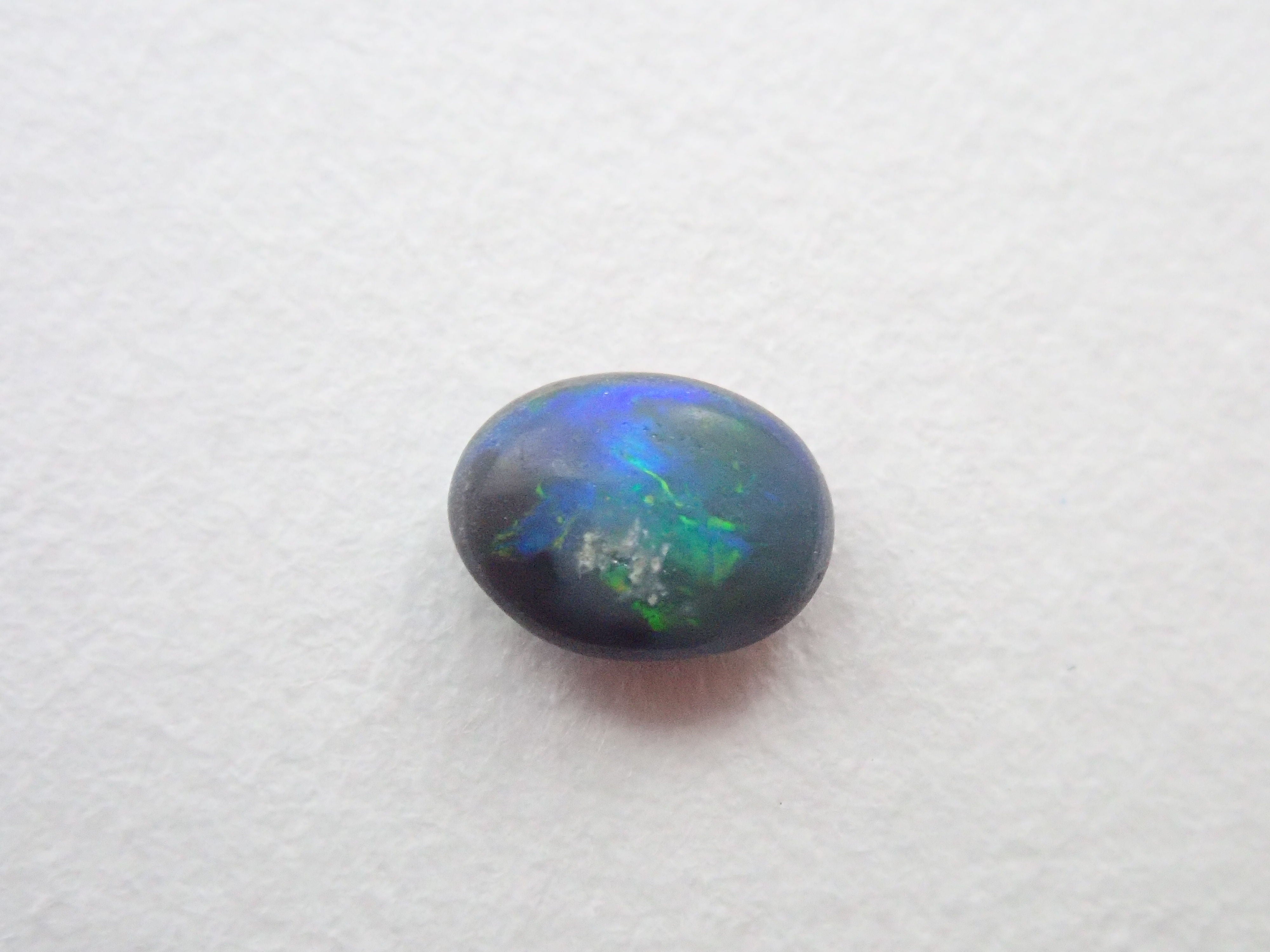 Black opal 0.179ct loose