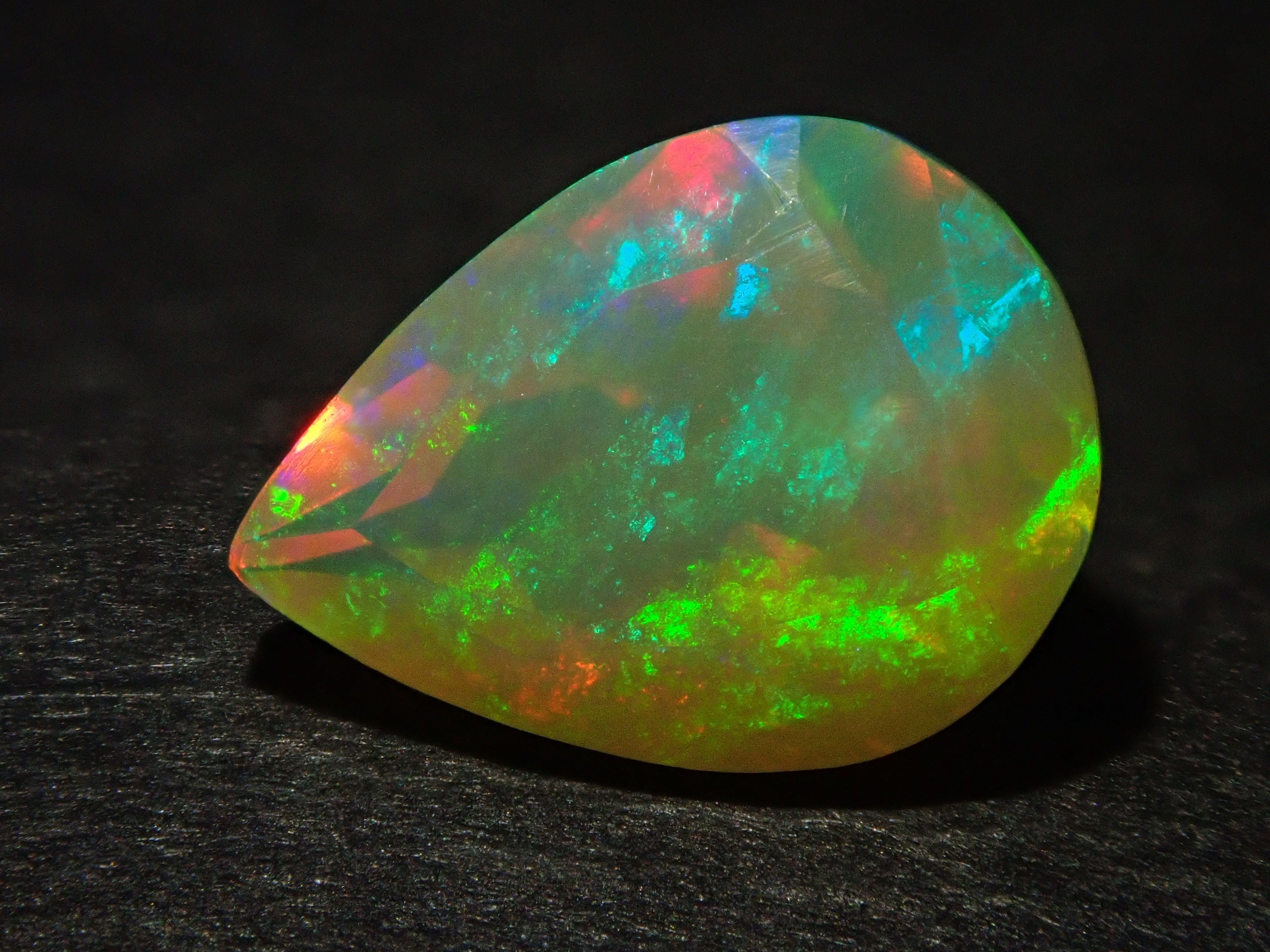 Fire opal 0.721ct loose (faceted cut)