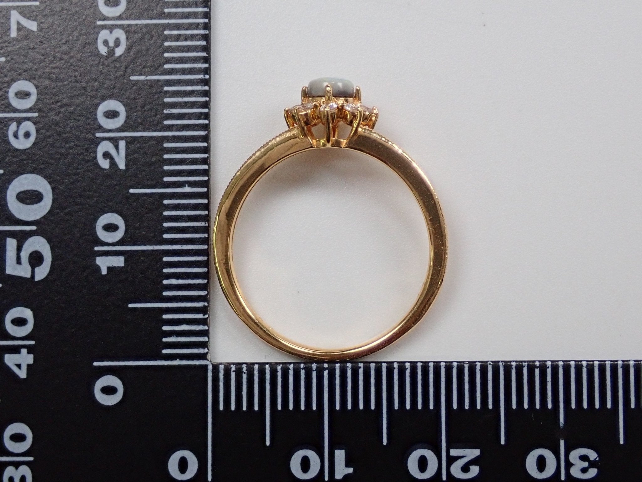 K18ブラックオパール0.2ct リング - KARATZ STORE｜カラッツSTORE