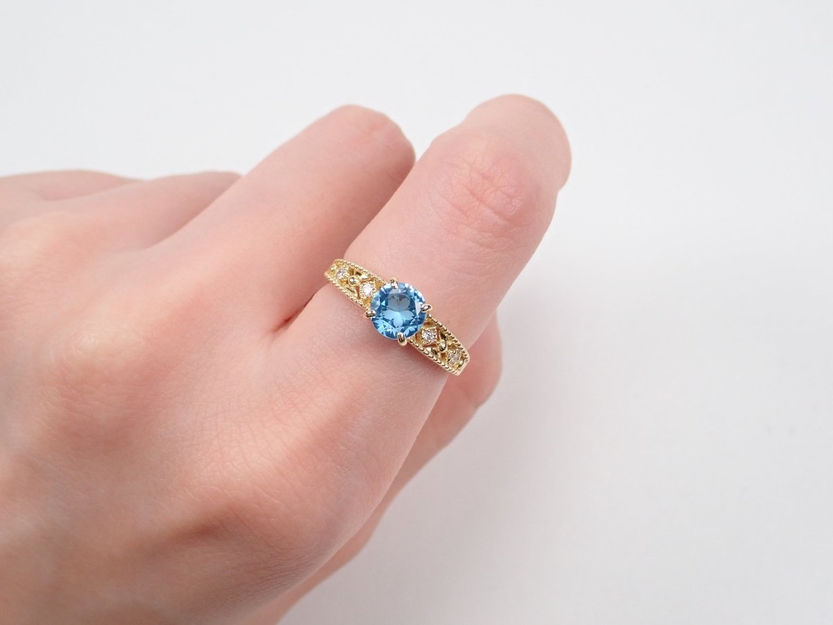 【さくらインカット】K18スイスブルートパーズ0.87ct リング - カラッツSTORE